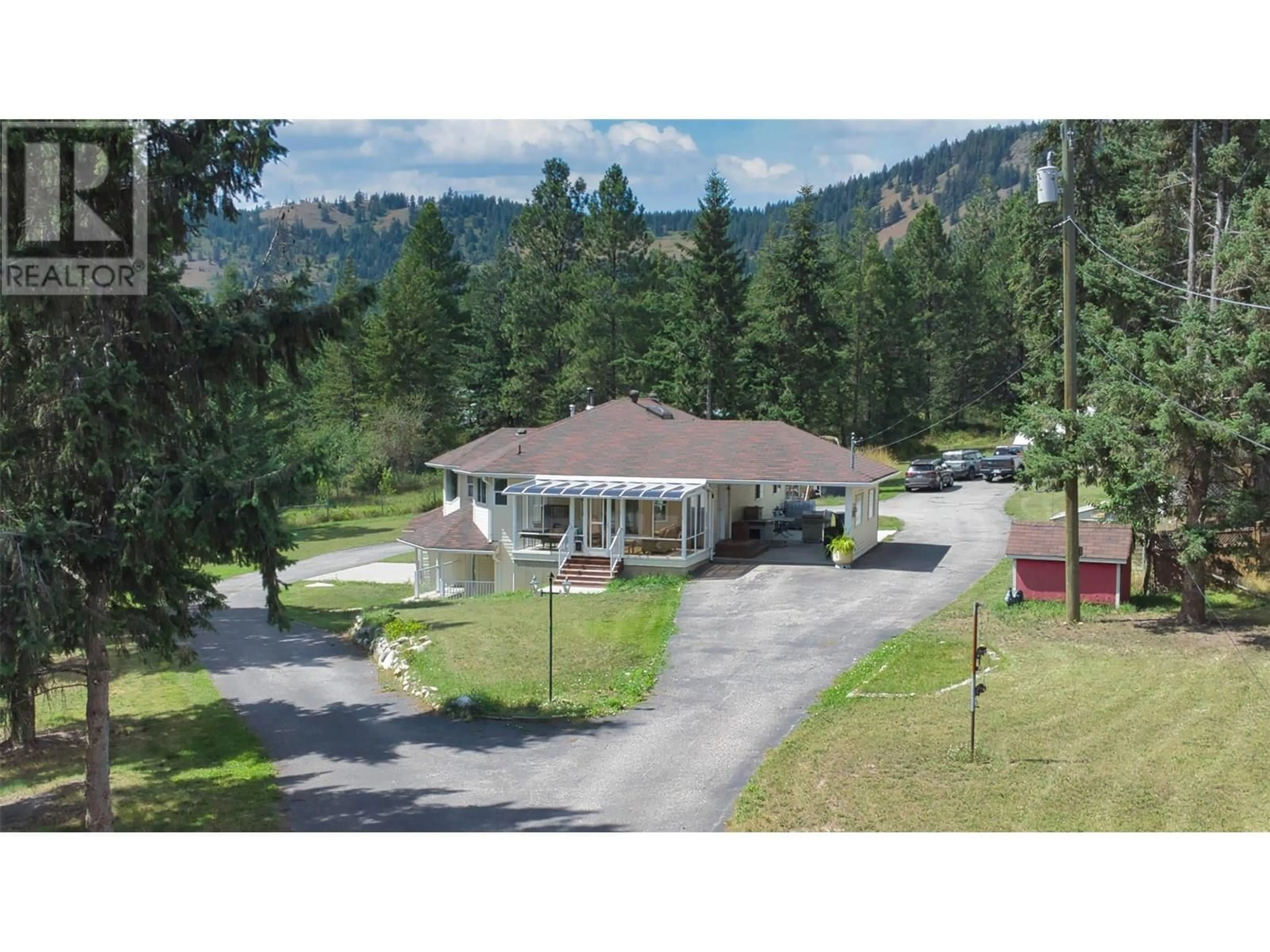 A pic from outside/outdoor area/front of a property/back of a property/a pic from drone, mountain view for 90 MCINNES ROAD, Lumby British Columbia V0E2G1