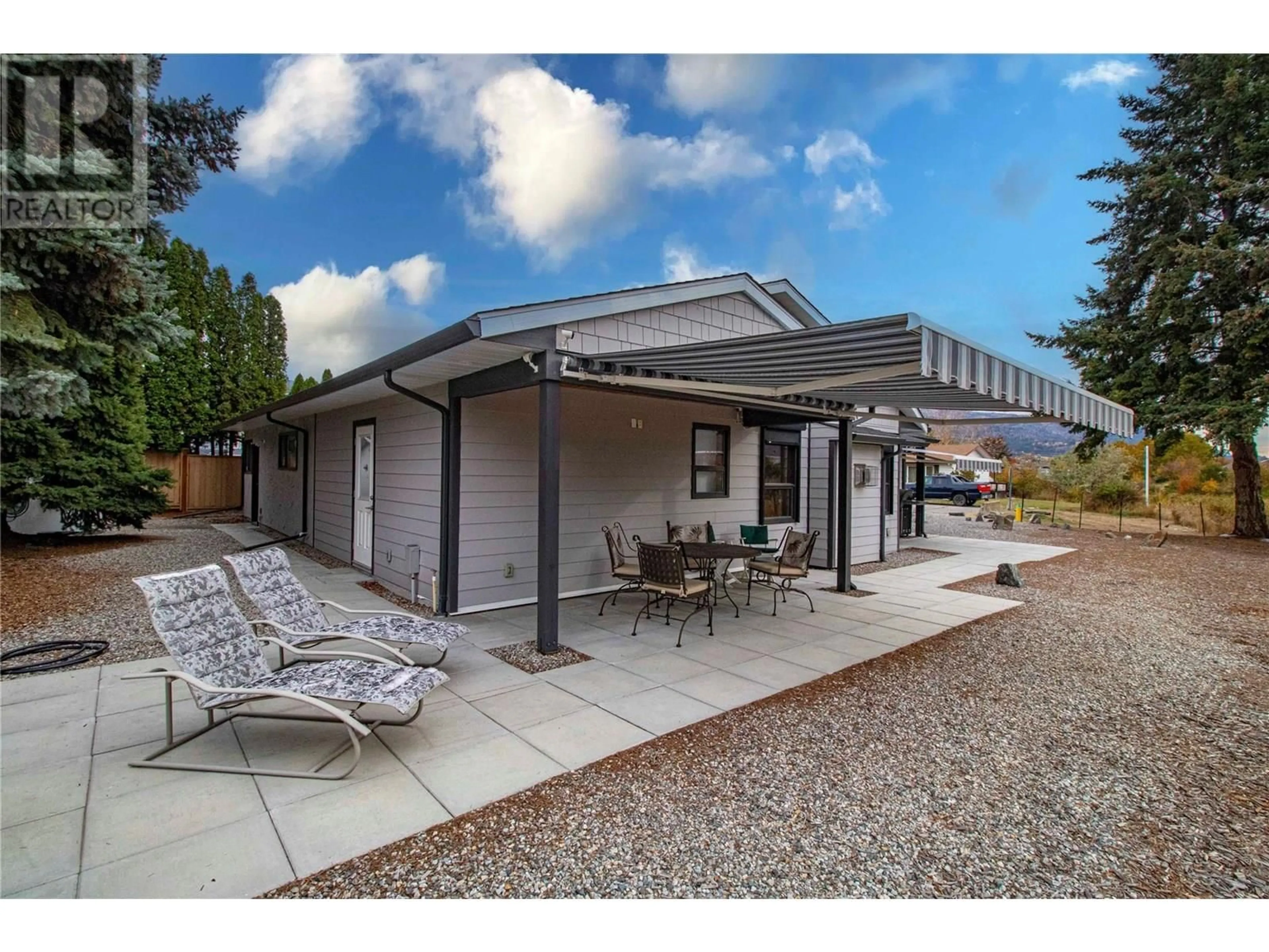 Home with vinyl exterior material, street for 303 ROY AVENUE, Penticton British Columbia V2A7M8