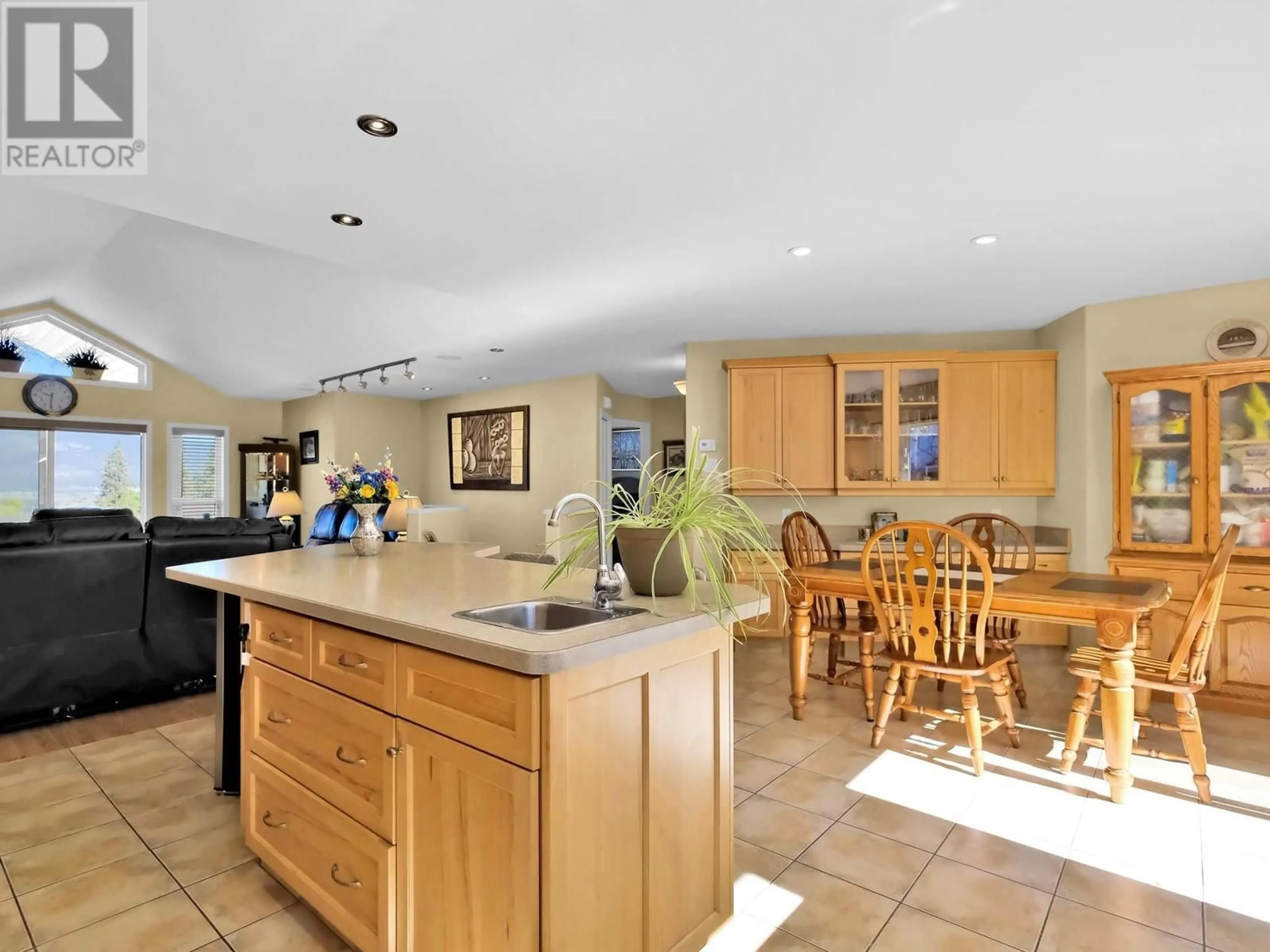 Open concept kitchen, ceramic/tile floor for 102 - 695 PINEVIEW ROAD, Penticton British Columbia V2A7S8