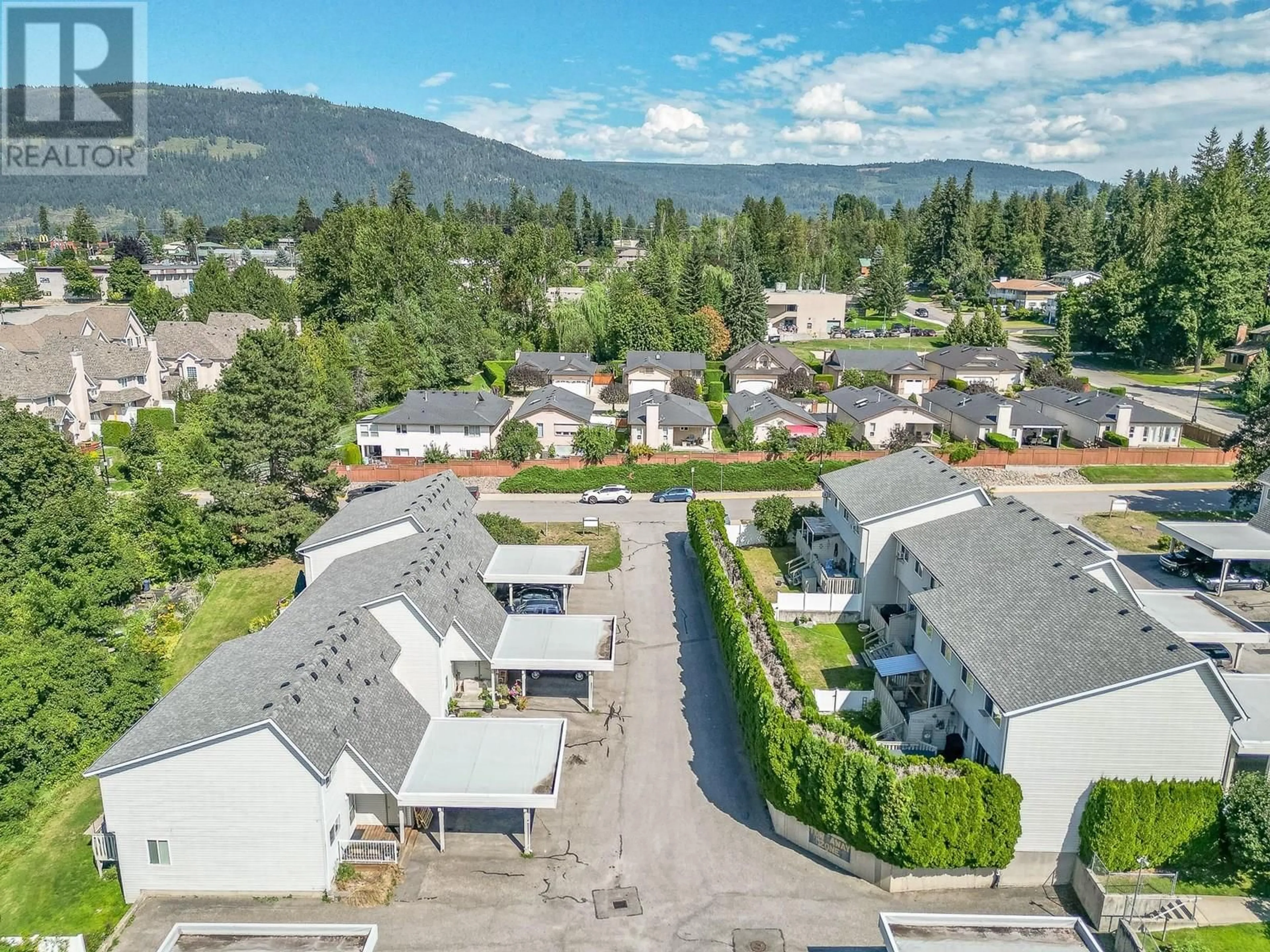 A pic from outside/outdoor area/front of a property/back of a property/a pic from drone, mountain view for 563 24 STREET NORTHEAST, Salmon Arm British Columbia V1E2K2