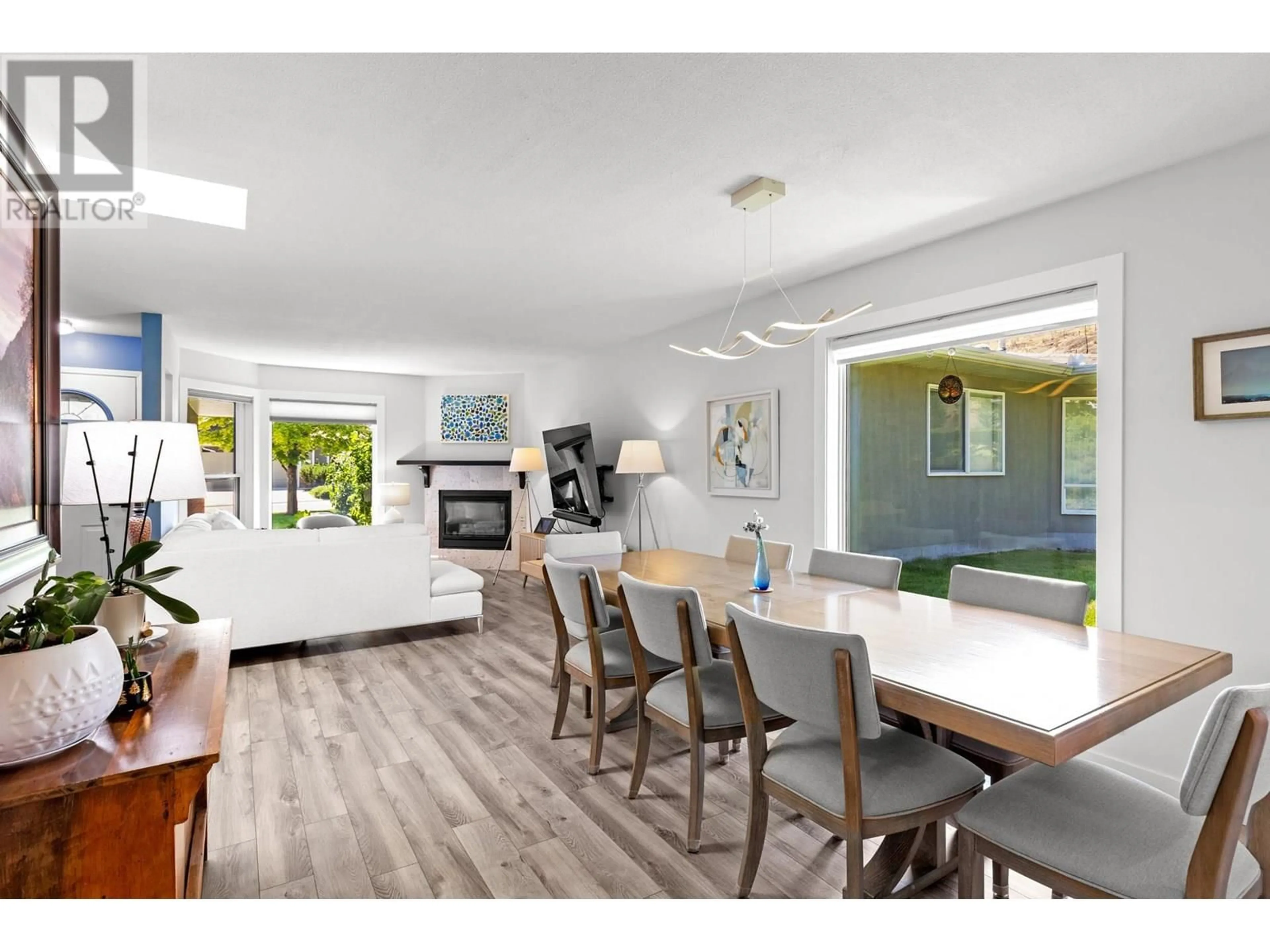 Open concept kitchen, wood/laminate floor for 132 - 4035 GELLATLY ROAD, West Kelowna British Columbia V4T1R7