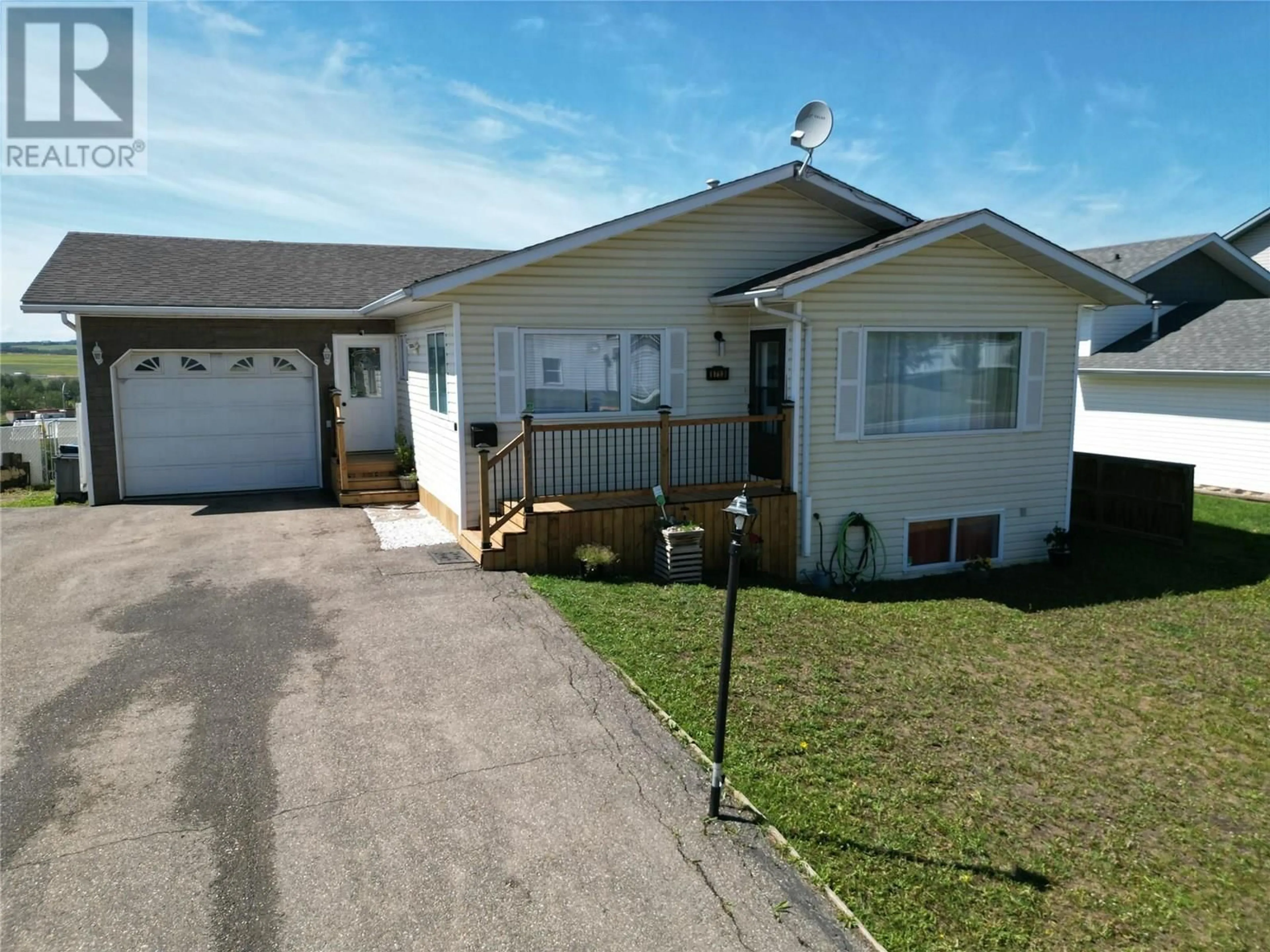 Home with vinyl exterior material, street for 8713 20A STREET, Dawson Creek British Columbia V1G4W3