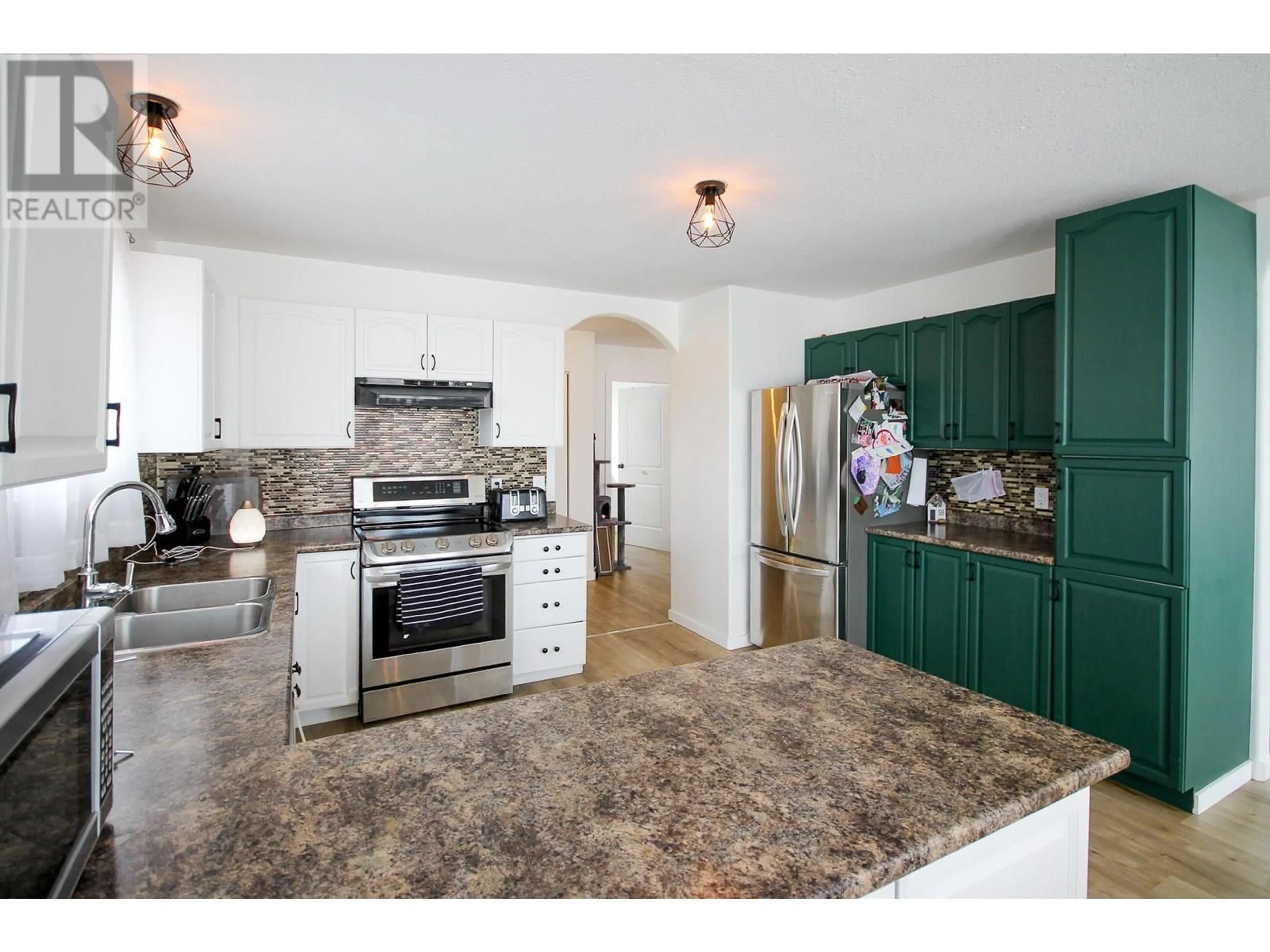 Open concept kitchen, ceramic/tile floor for 8713 20A STREET, Dawson Creek British Columbia V1G4W3