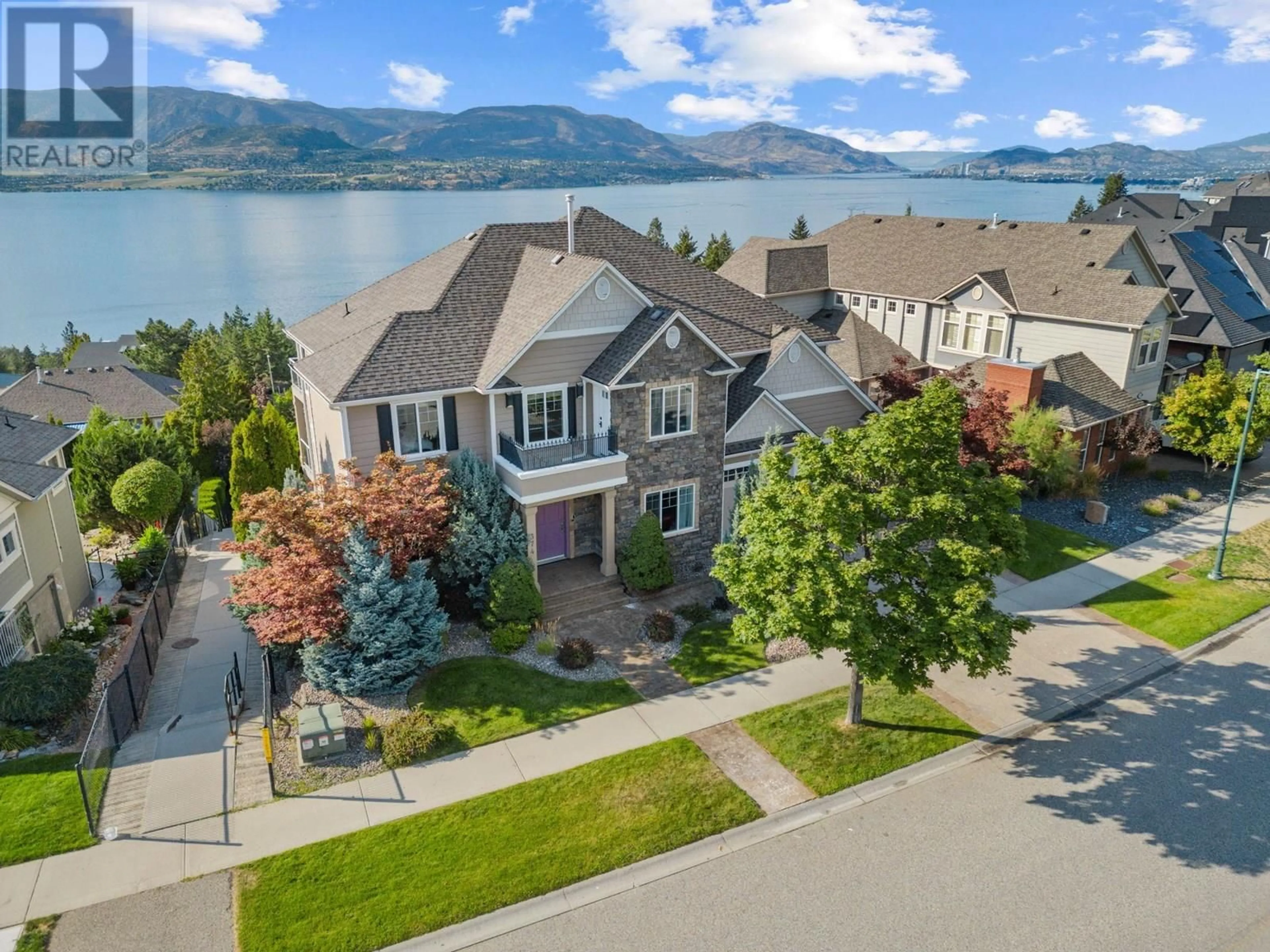 A pic from outside/outdoor area/front of a property/back of a property/a pic from drone, water/lake/river/ocean view for 374 QUILCHENA DRIVE, Kelowna British Columbia V1W4W4