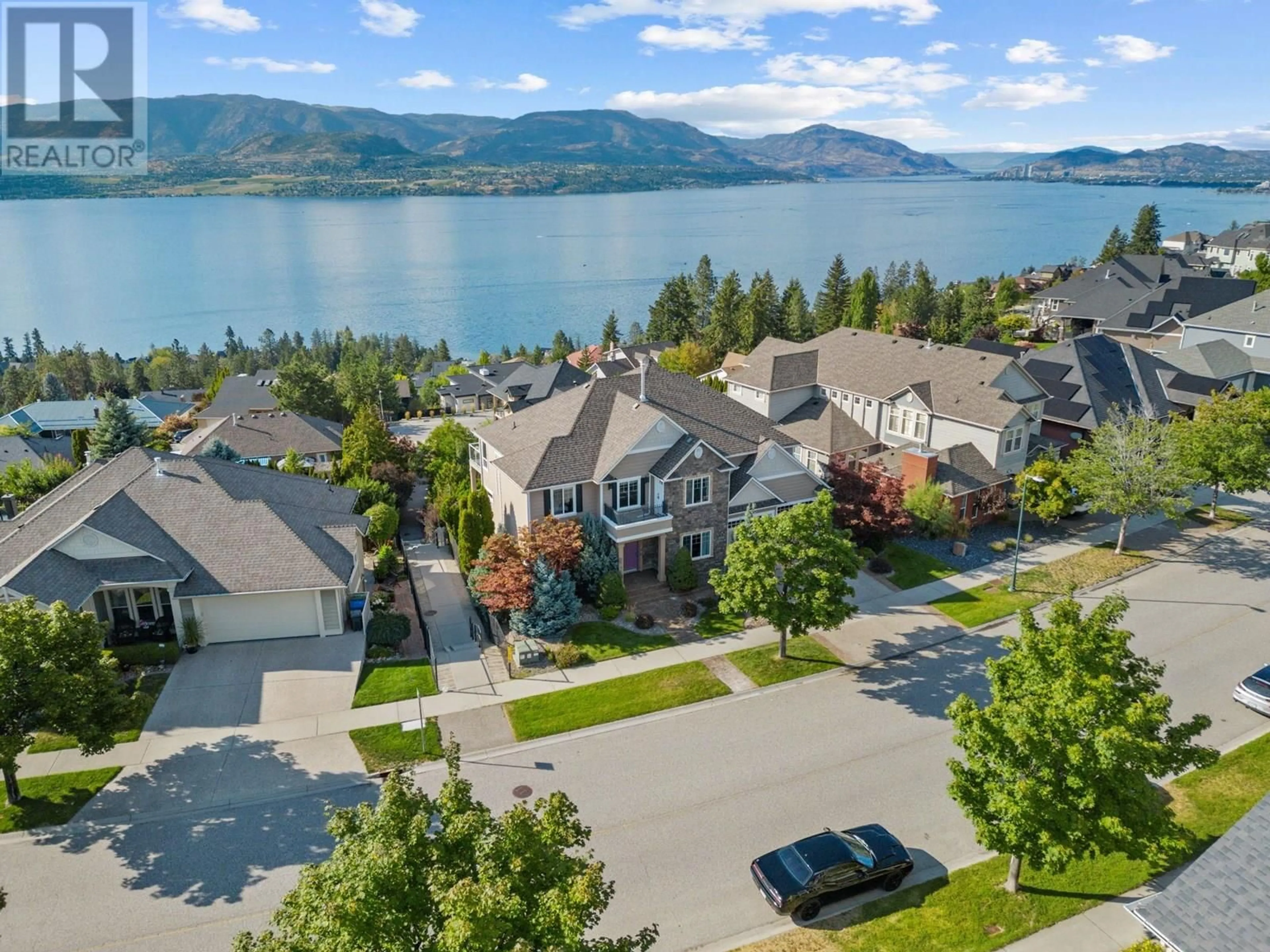 A pic from outside/outdoor area/front of a property/back of a property/a pic from drone, water/lake/river/ocean view for 374 QUILCHENA DRIVE, Kelowna British Columbia V1W4W4