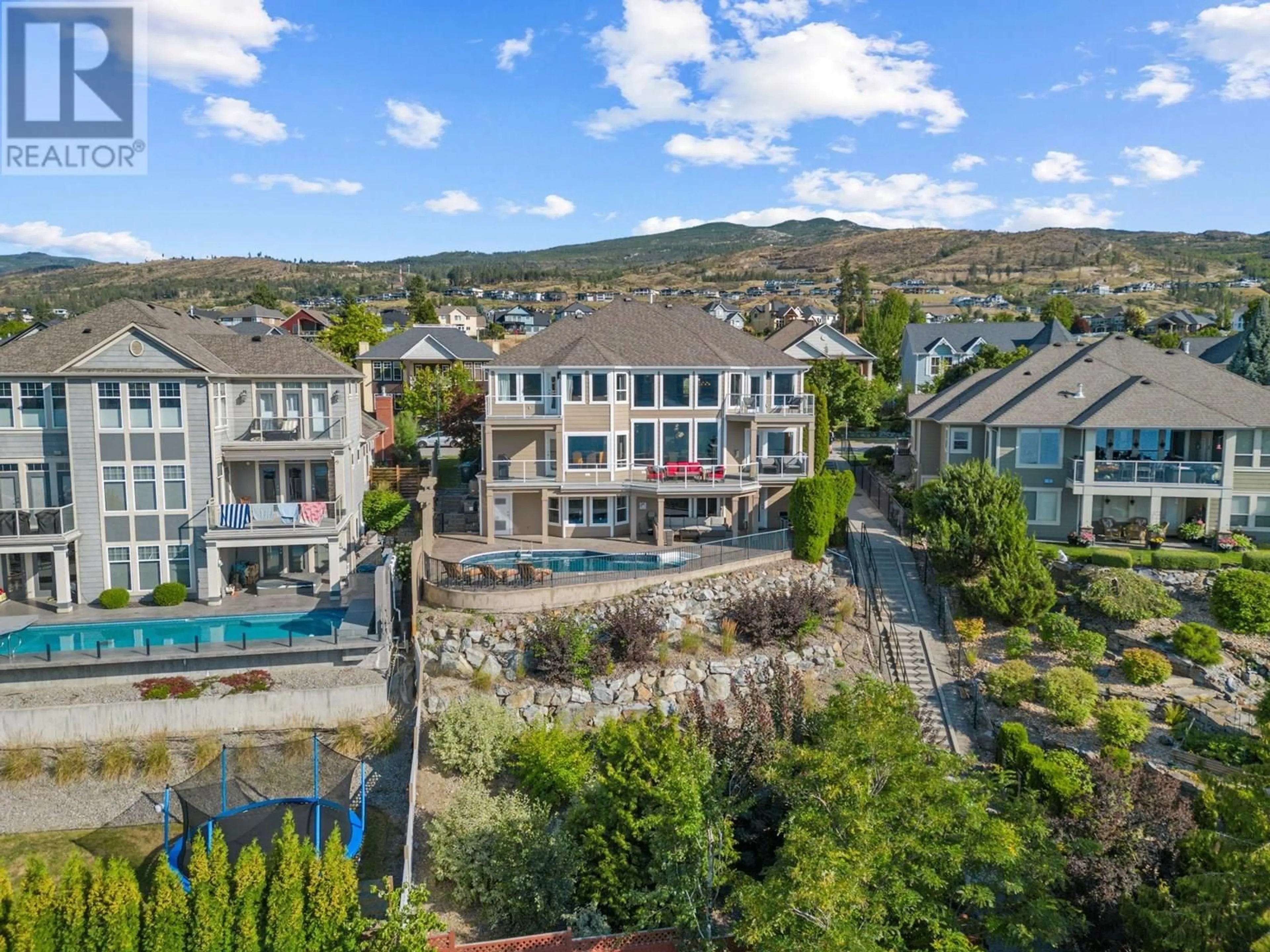 A pic from outside/outdoor area/front of a property/back of a property/a pic from drone, water/lake/river/ocean view for 374 QUILCHENA DRIVE, Kelowna British Columbia V1W4W4