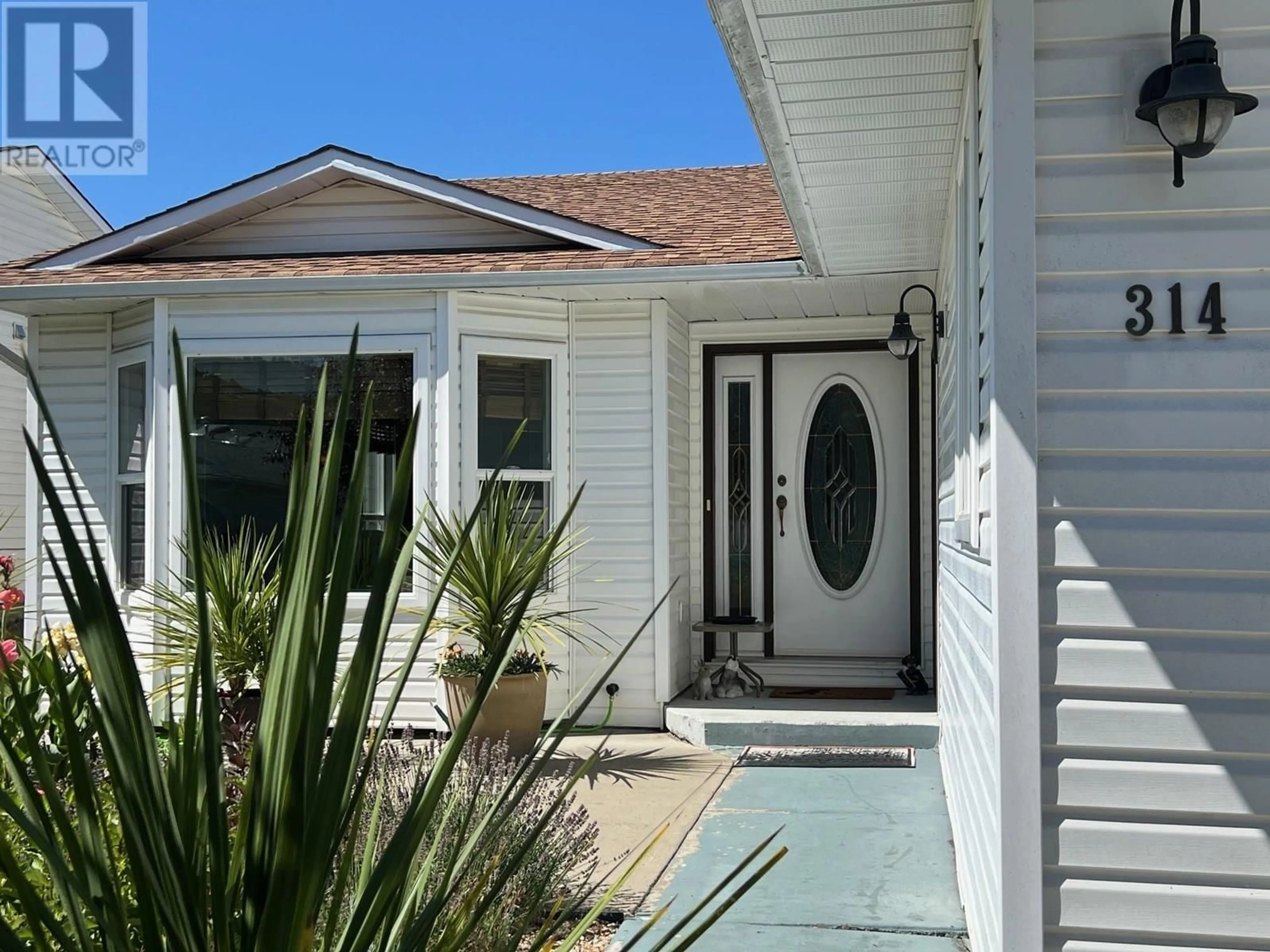 Home with vinyl exterior material, street for 314 3 RD STREET, Vernon British Columbia V1H1Z1