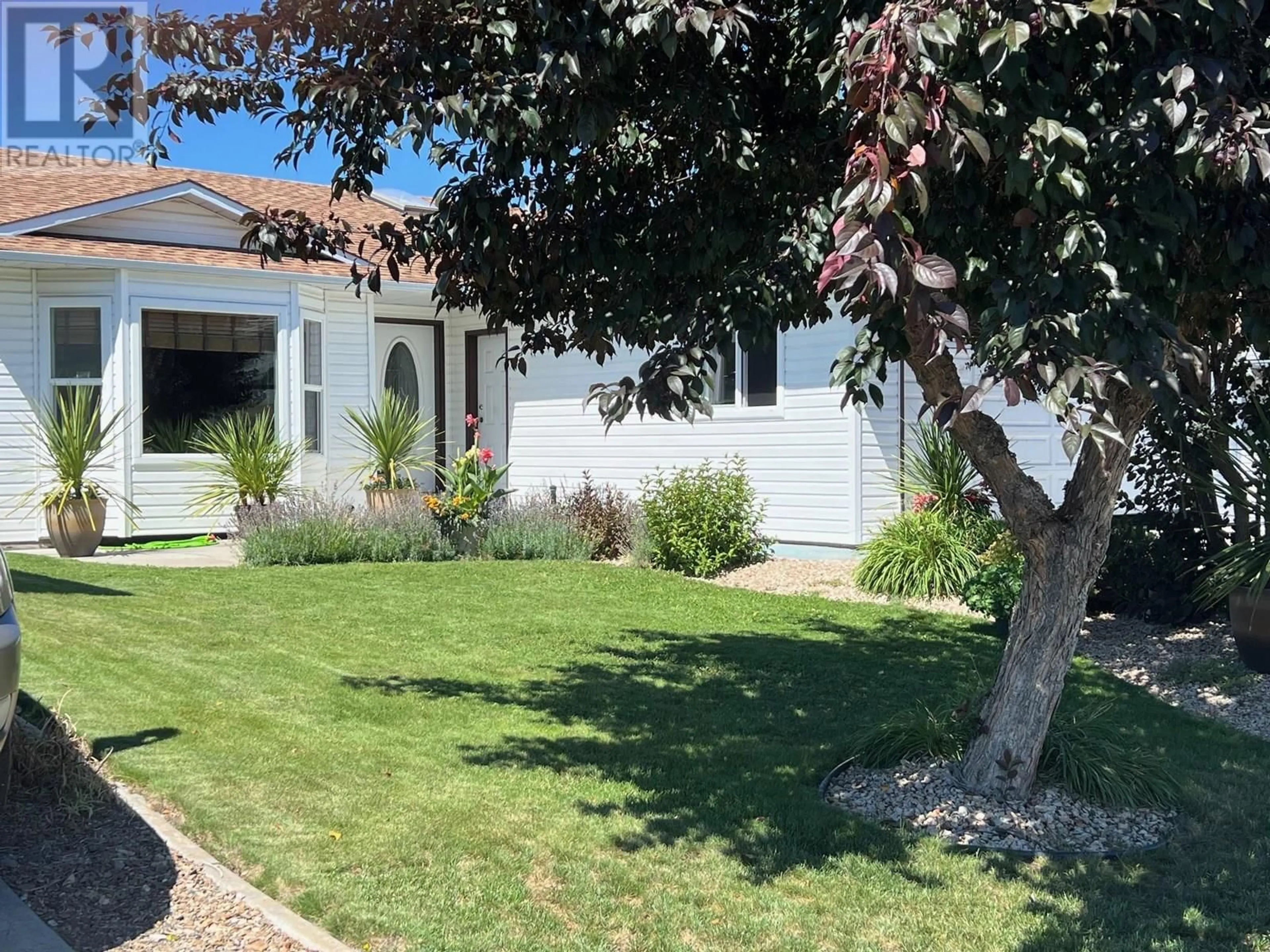 A pic from outside/outdoor area/front of a property/back of a property/a pic from drone, street for 314 3 RD STREET, Vernon British Columbia V1H1Z1