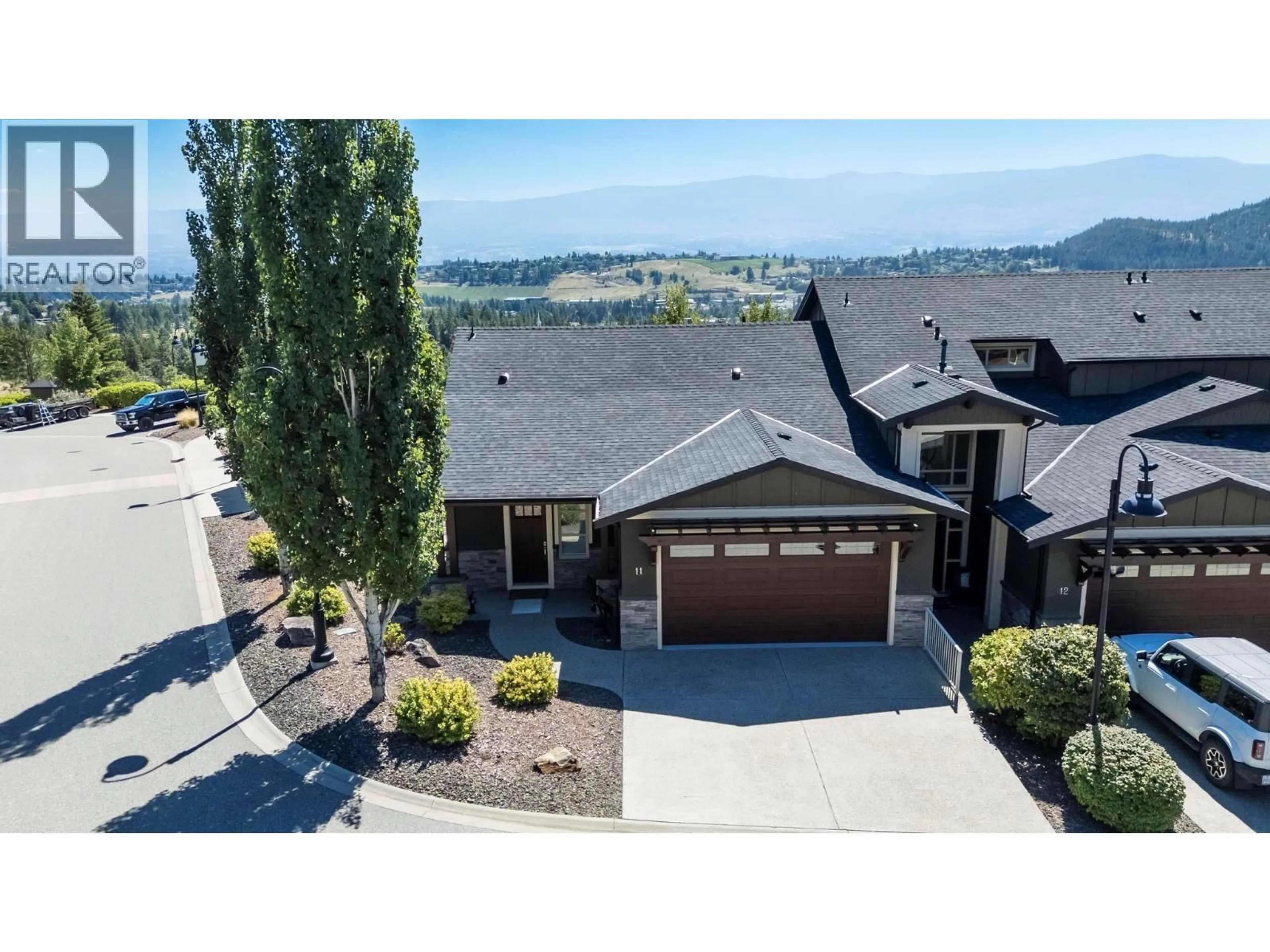 A pic from outside/outdoor area/front of a property/back of a property/a pic from drone, mountain view for 11 - 1870 ROSEALEE LANE, West Kelowna British Columbia V1Z4E5
