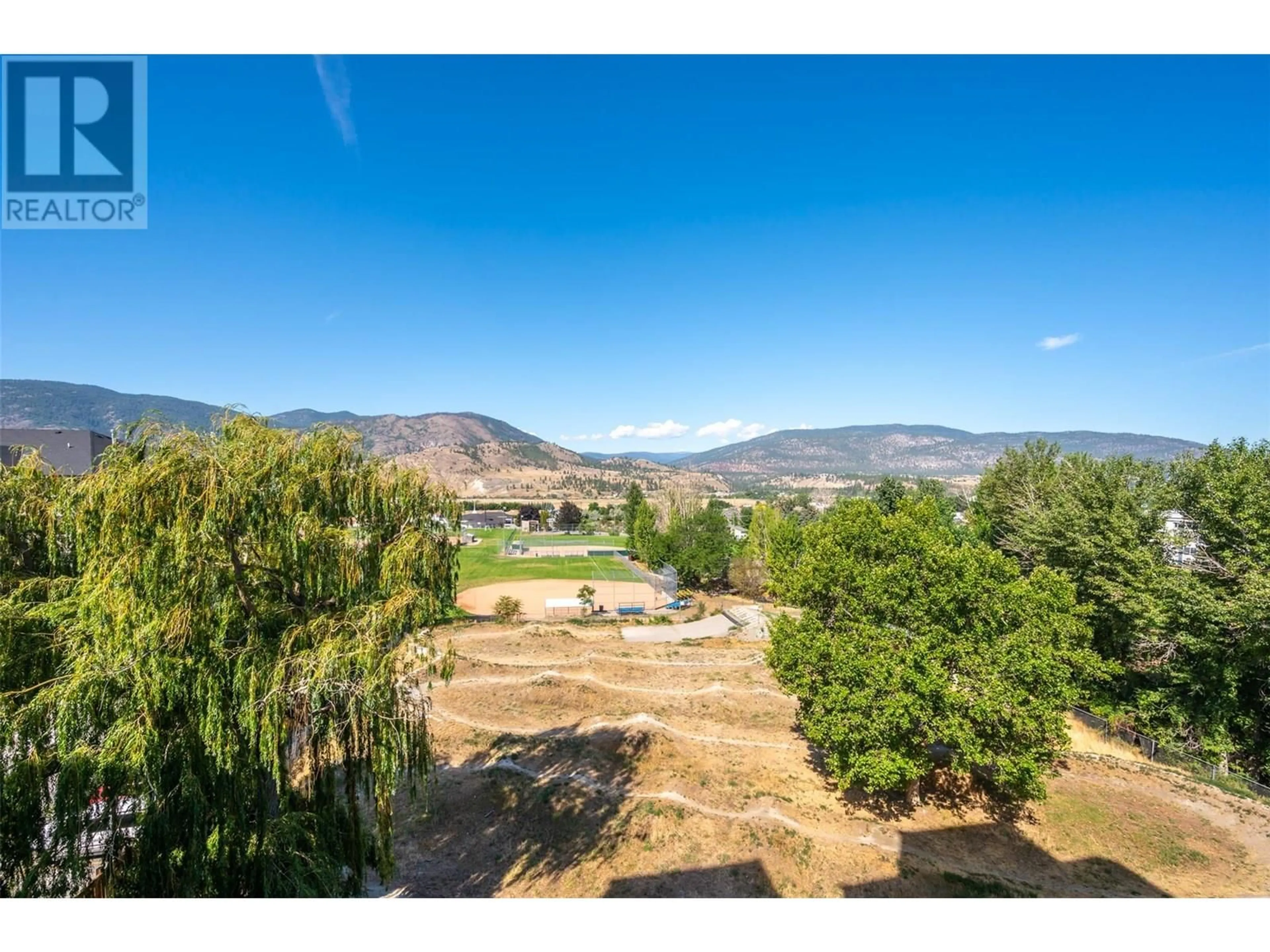 A pic from outside/outdoor area/front of a property/back of a property/a pic from drone, water/lake/river/ocean view for 507 - 2255 ATKINSON STREET, Penticton British Columbia V2A8R7