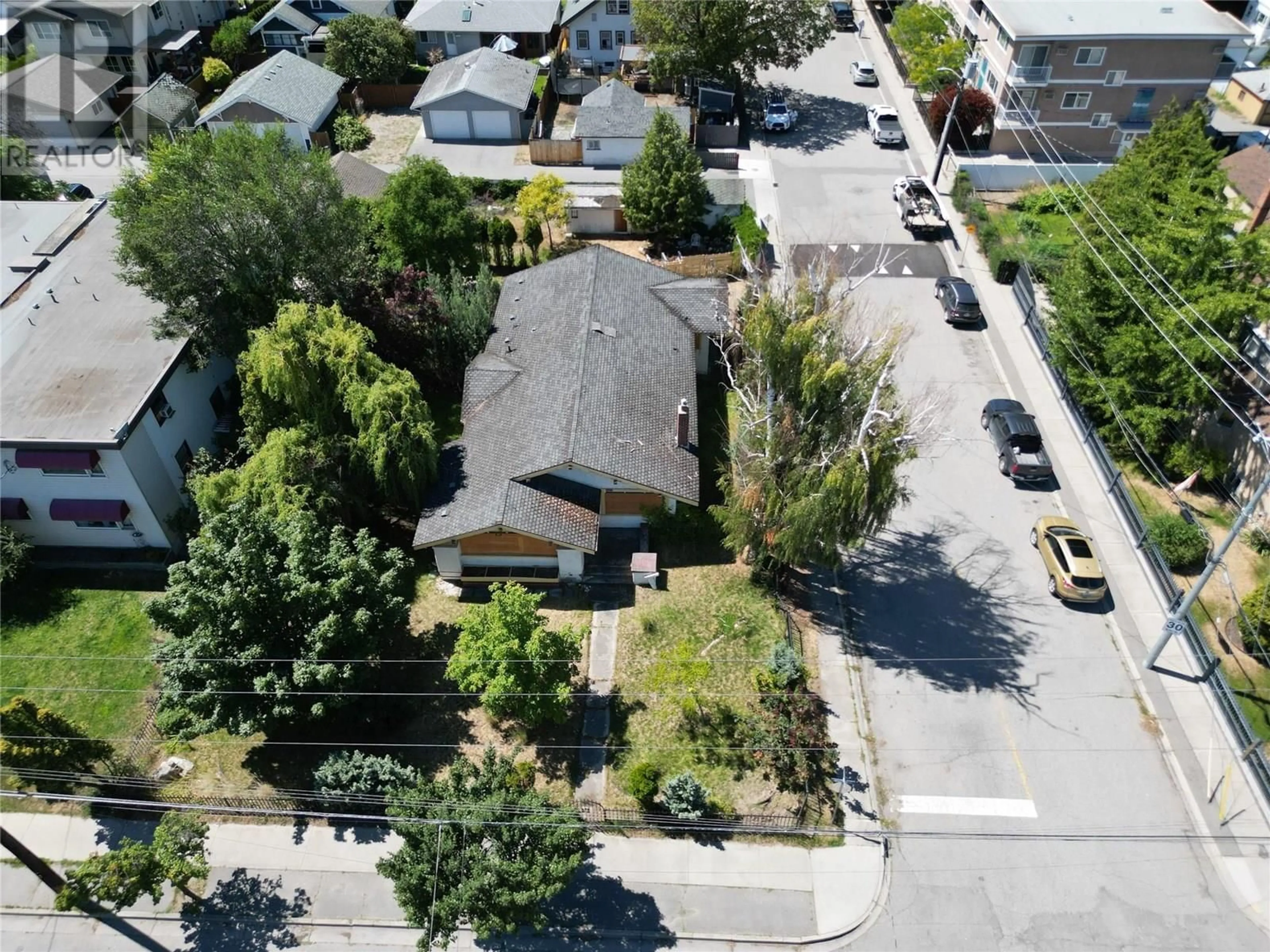 A pic from outside/outdoor area/front of a property/back of a property/a pic from drone, street for 601 WINNIPEG STREET, Penticton British Columbia V2A5N1