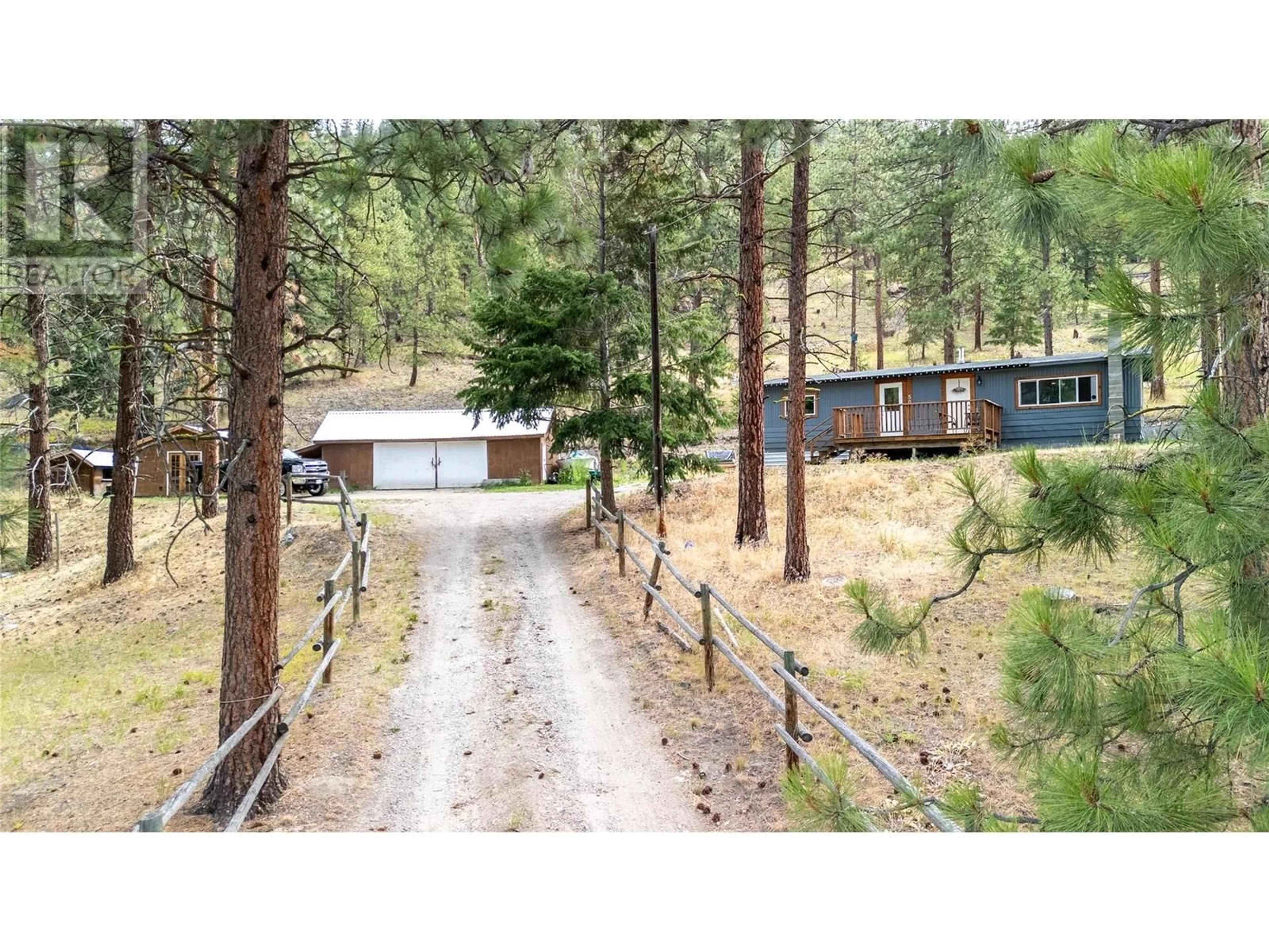 A pic from outside/outdoor area/front of a property/back of a property/a pic from drone, forest/trees view for 501 FISH LAKE ROAD, Summerland British Columbia V0H1Z8