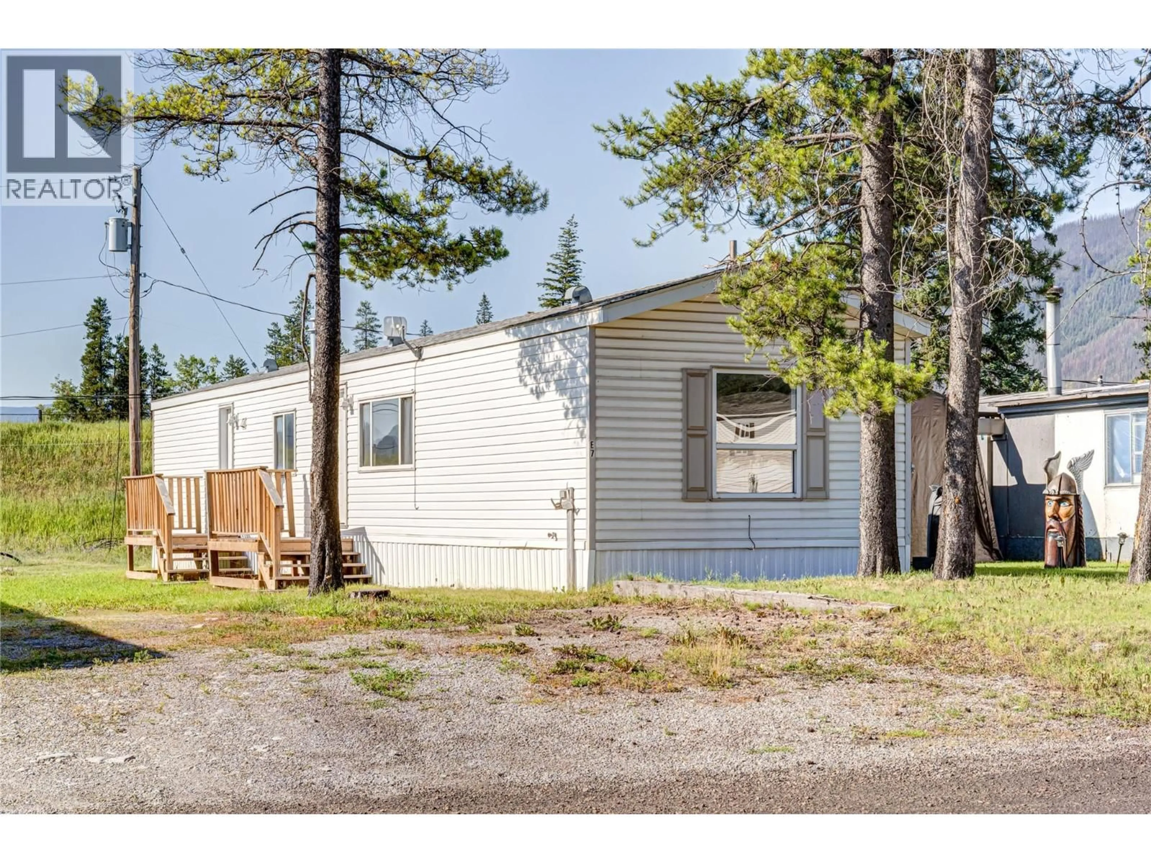 Home with vinyl exterior material, street for E7-7555 HIGHWAY 43 OTHER, Sparwood British Columbia V0B2G1