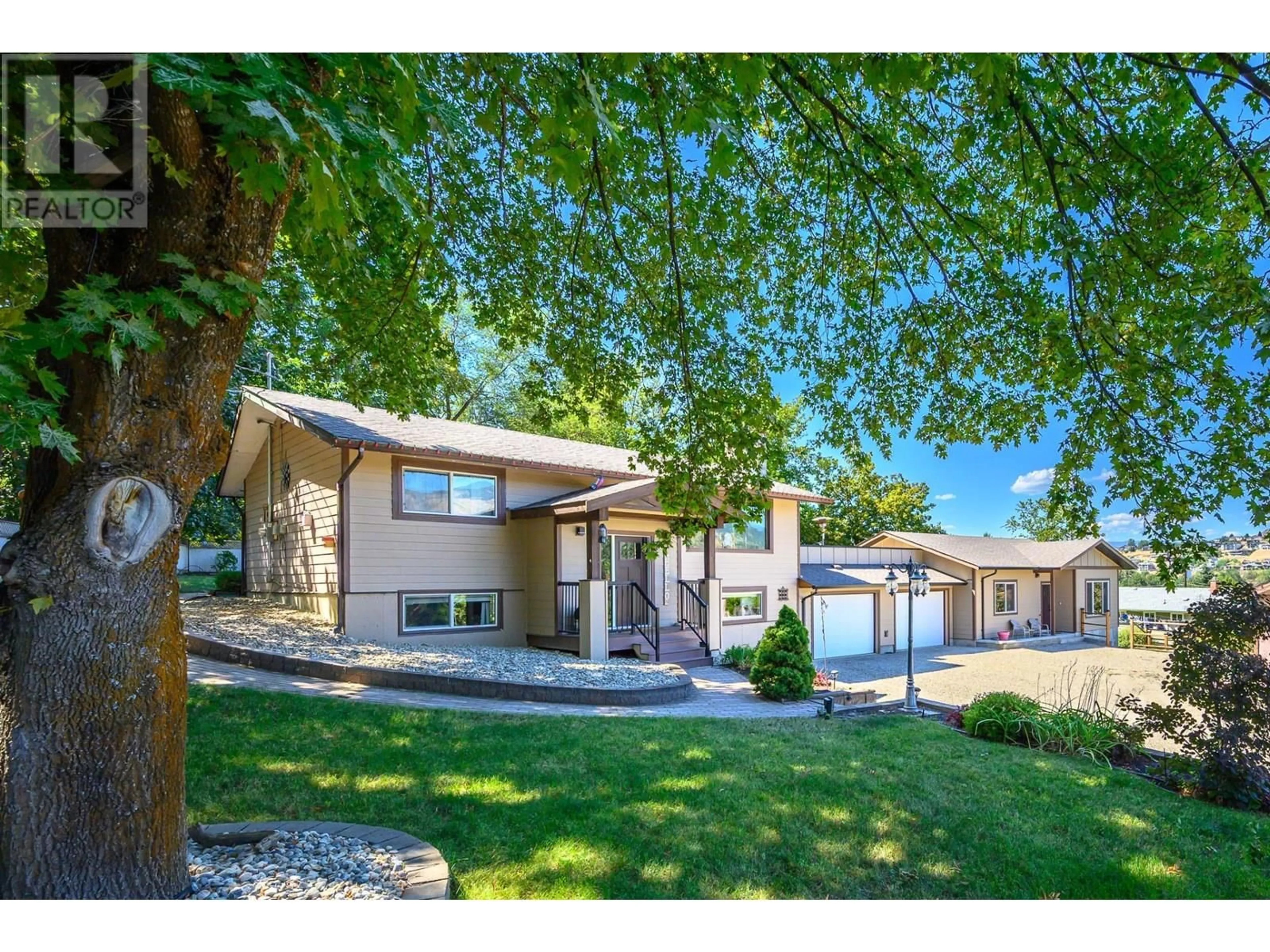 A pic from outside/outdoor area/front of a property/back of a property/a pic from drone, street for 7506 MCCLOUNIE ROAD, Coldstream British Columbia V1B1P7