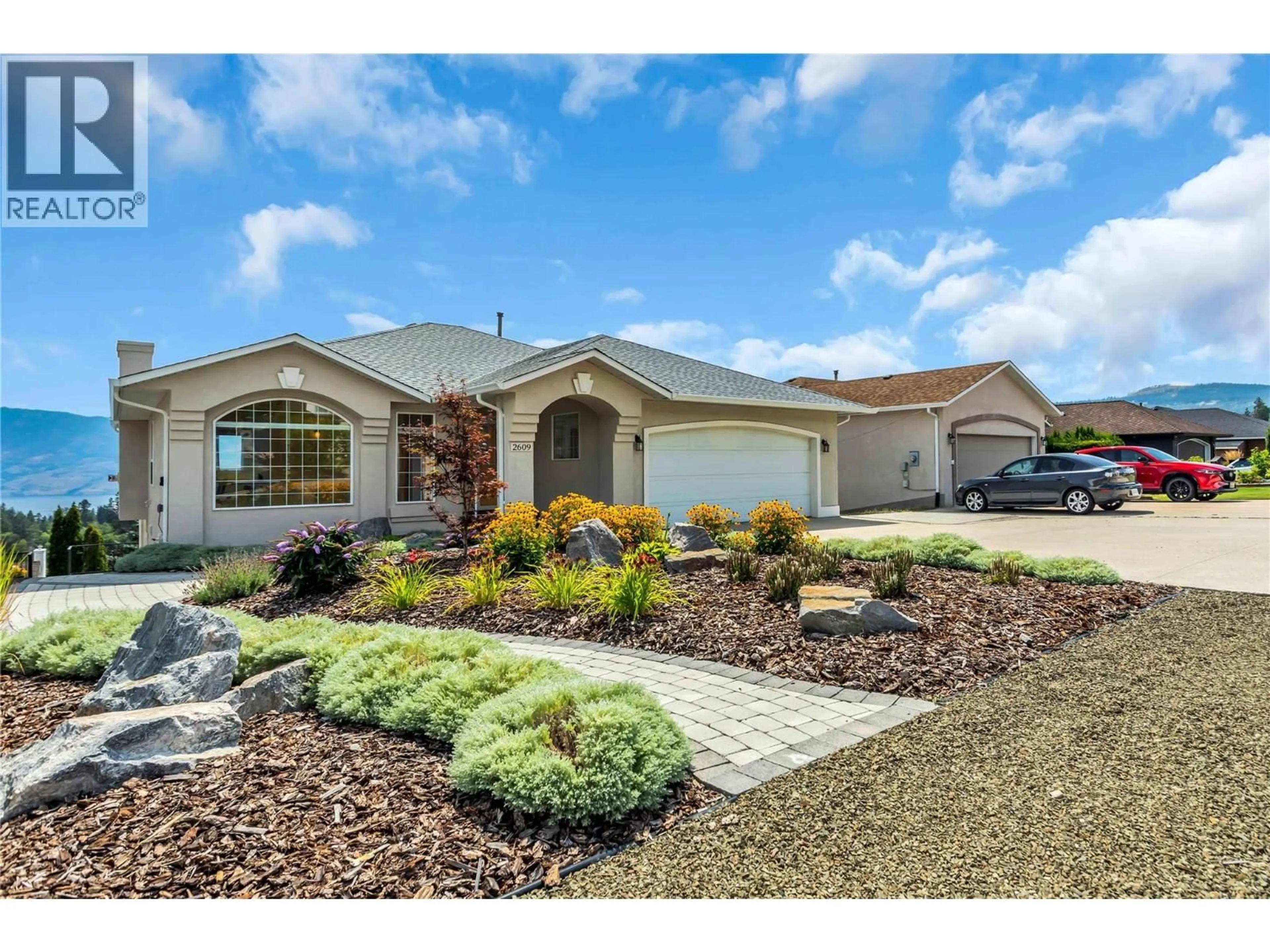 Home with vinyl exterior material, street for 2609 WILD HORSE DRIVE, West Kelowna British Columbia V4T2K9