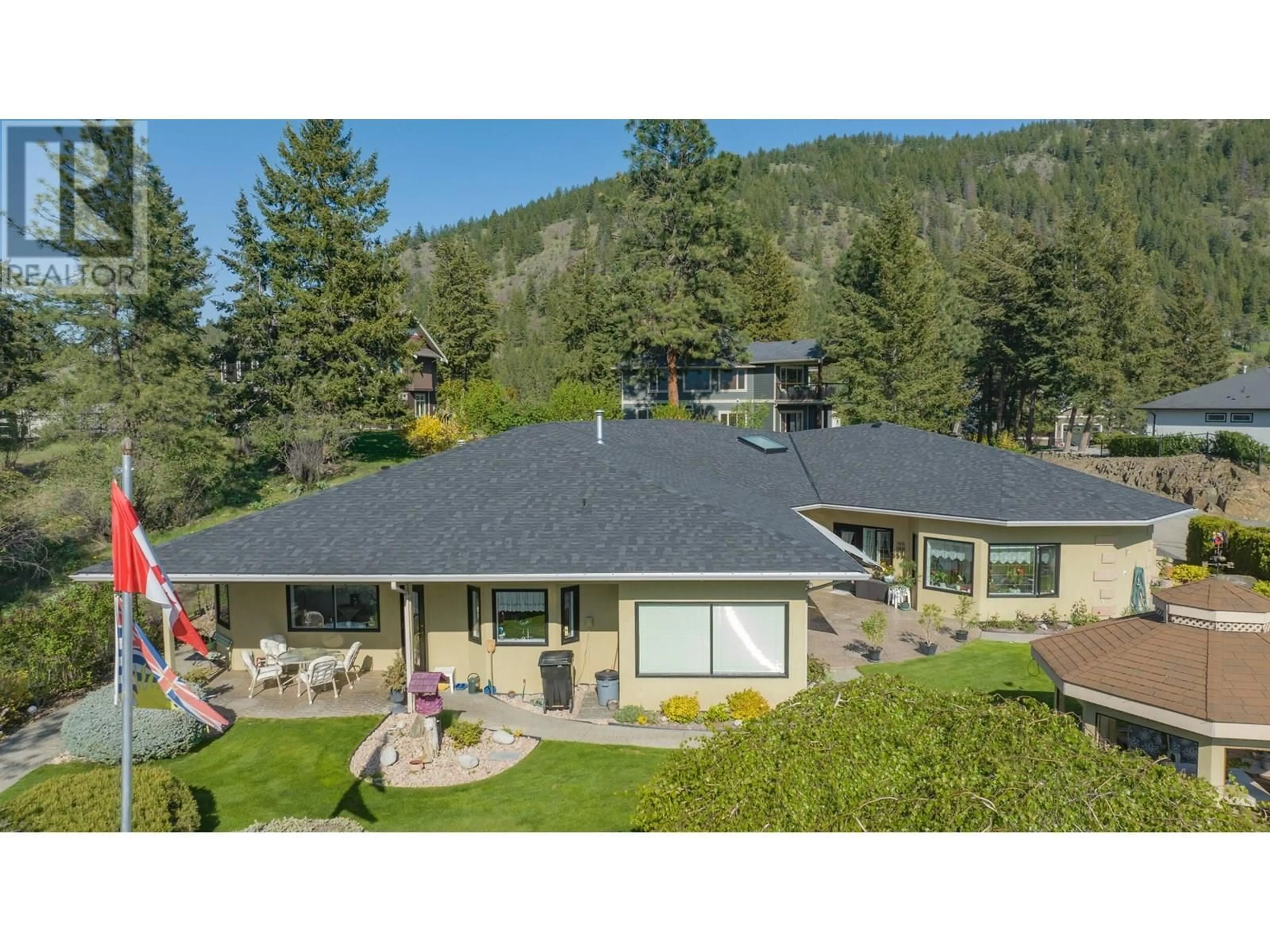 A pic from outside/outdoor area/front of a property/back of a property/a pic from drone, mountain view for 6 9196 TRONSON ROAD, Vernon British Columbia V1H1E8