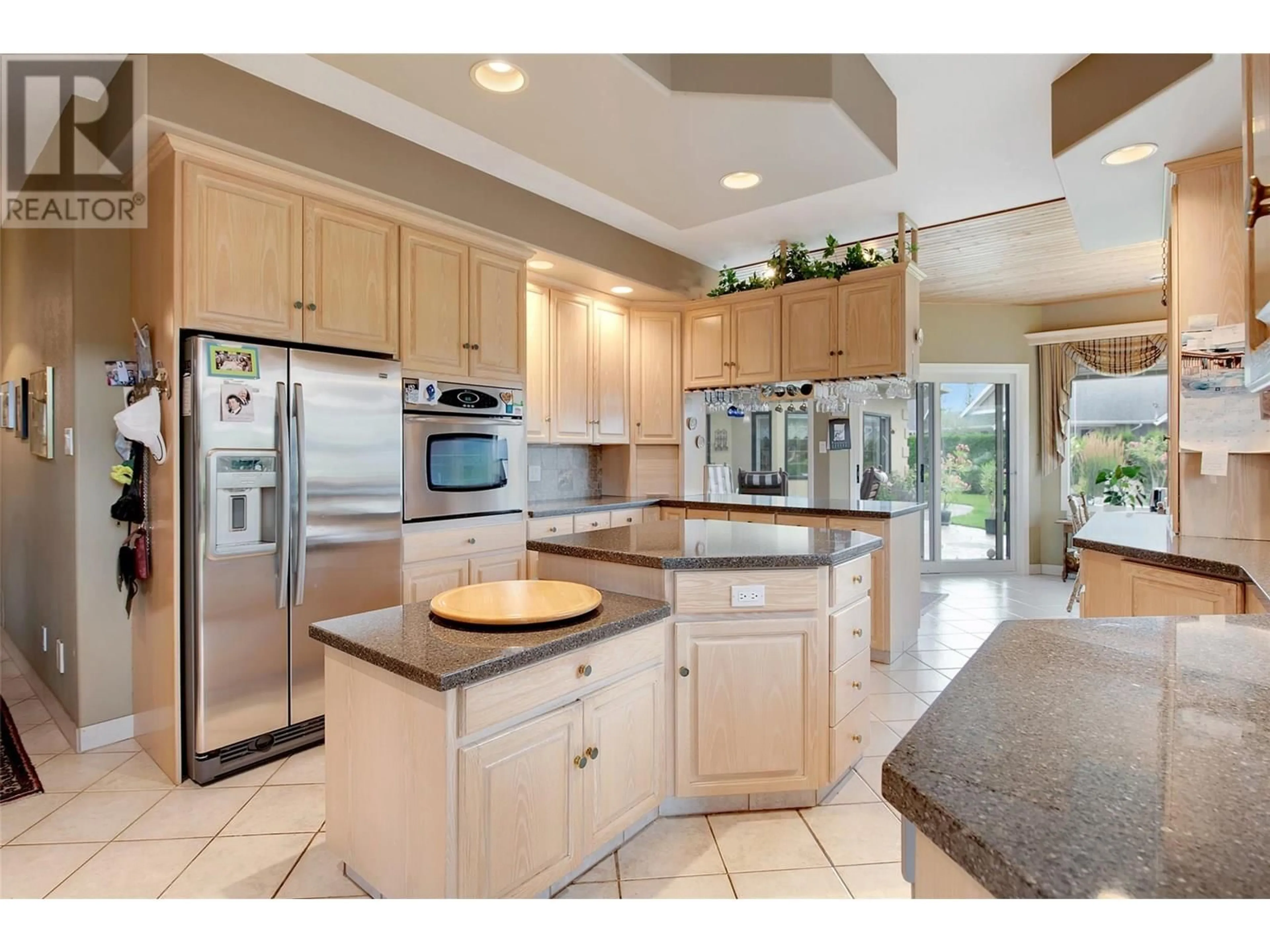 Open concept kitchen, ceramic/tile floor for 6 9196 TRONSON ROAD, Vernon British Columbia V1H1E8