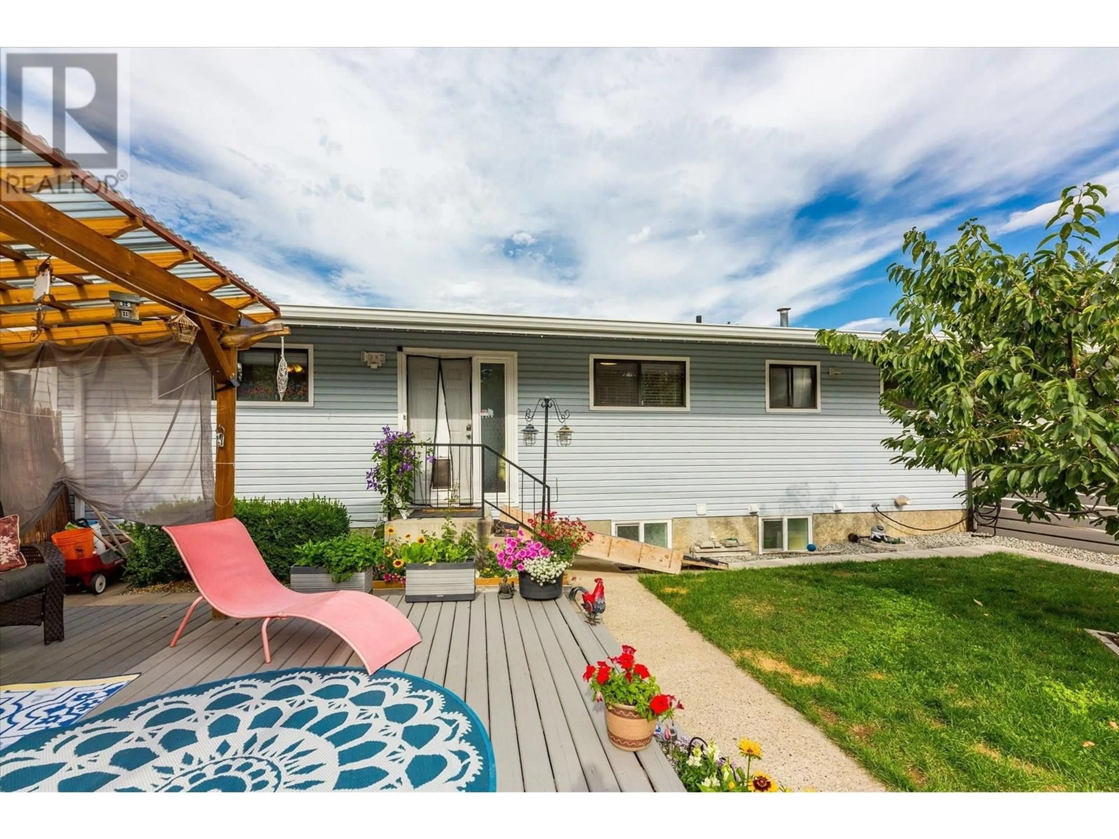 Home with vinyl exterior material, street for 3273 MCLEOD ROAD, West Kelowna British Columbia V4T1A9