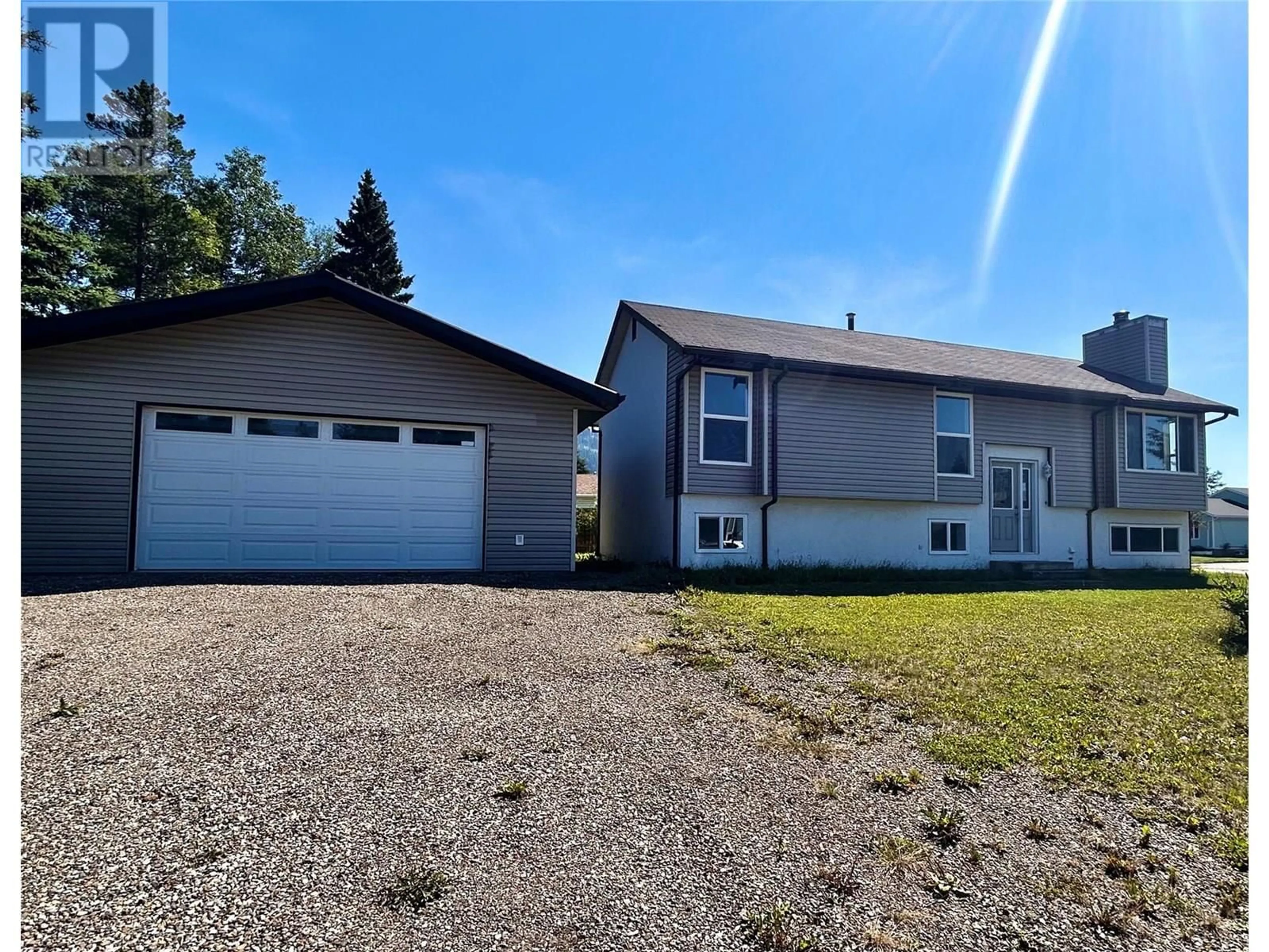 A pic from outside/outdoor area/front of a property/back of a property/a pic from drone, street for 103 FELLERS AVENUE, Tumbler Ridge British Columbia V0C2W0
