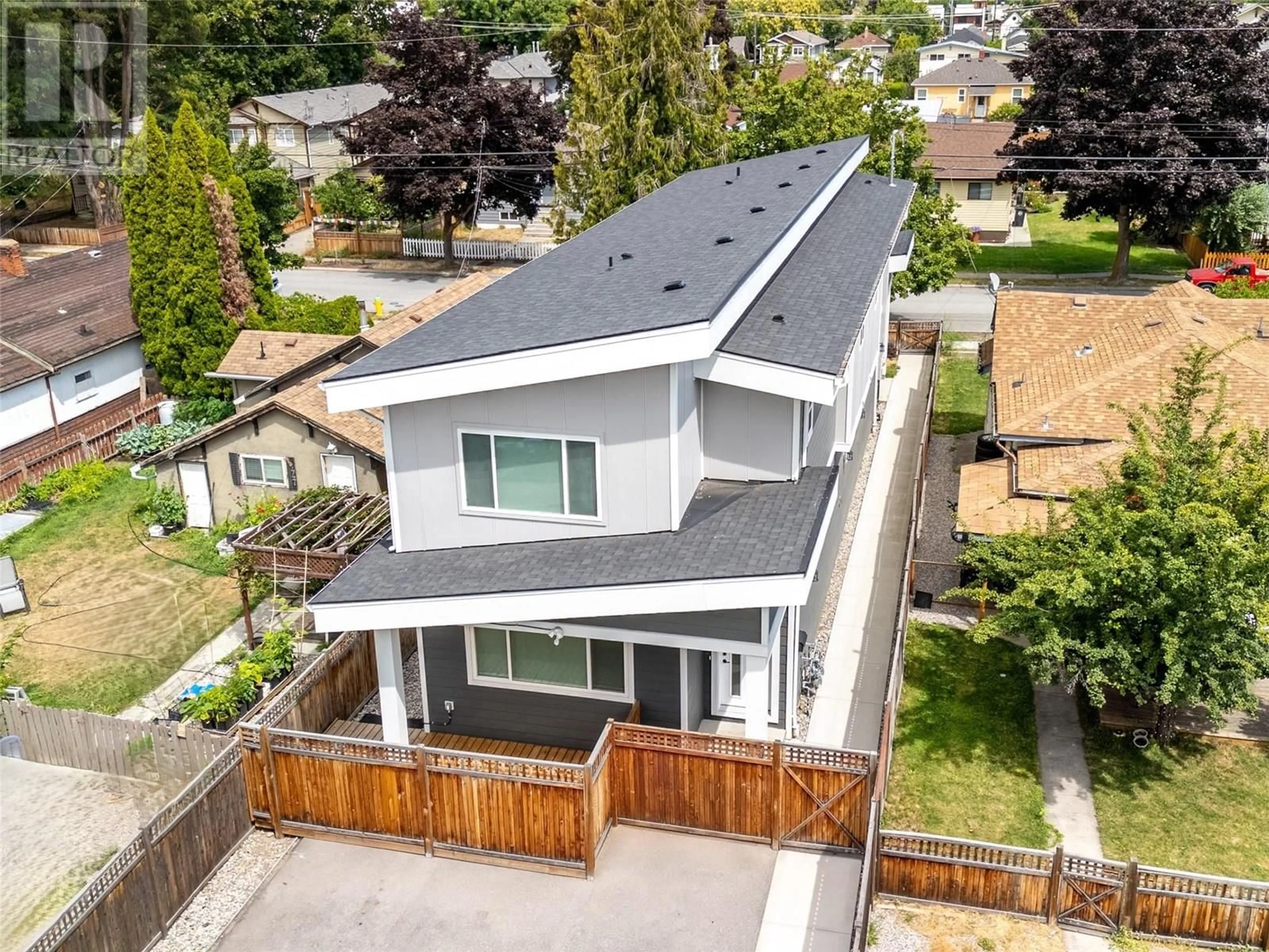 A pic from outside/outdoor area/front of a property/back of a property/a pic from drone, street for 102 - 453 MAURICE STREET, Penticton British Columbia V2A5V8