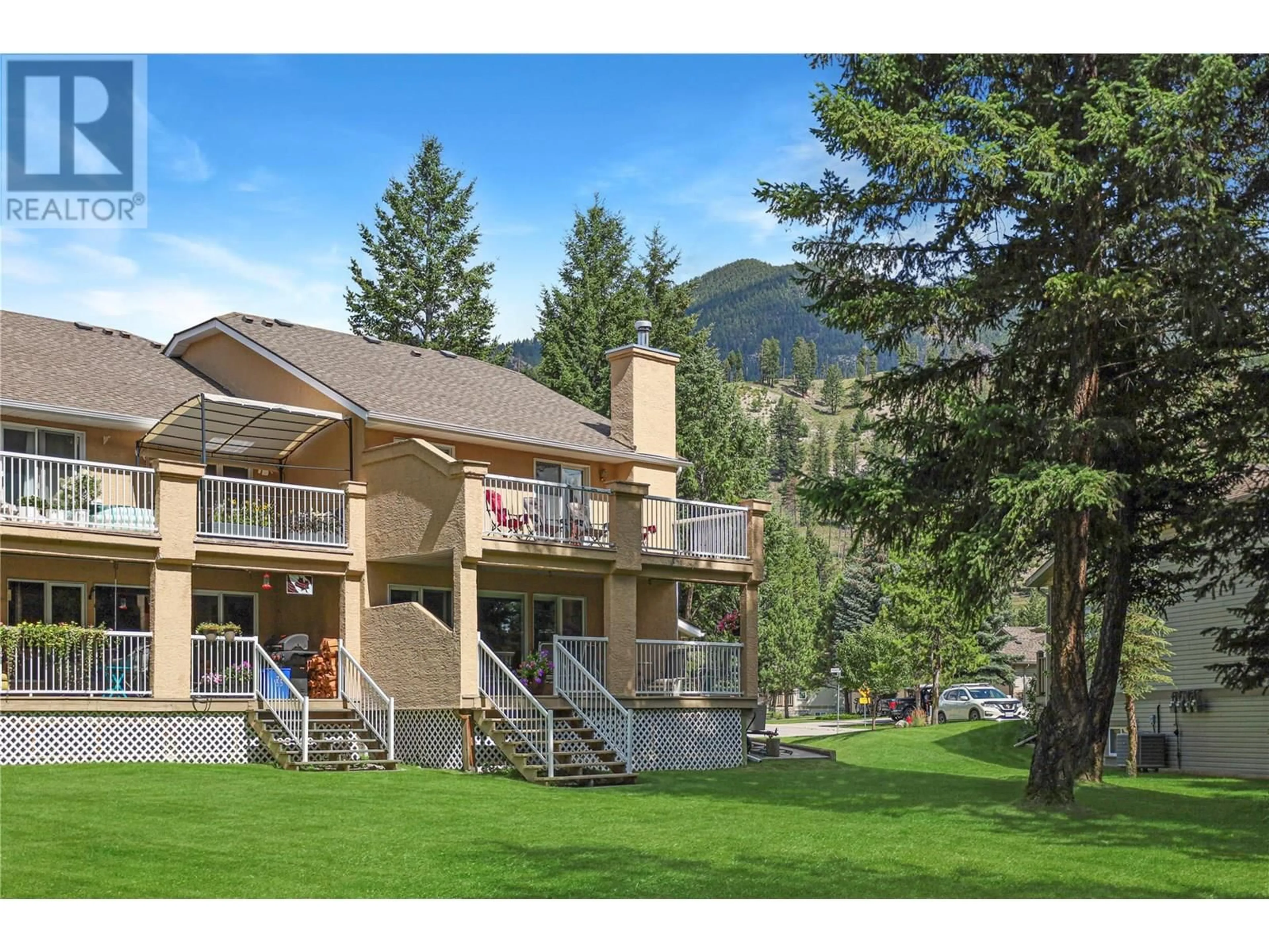 A pic from outside/outdoor area/front of a property/back of a property/a pic from drone, mountain view for 13 - 7595 PIONEER AVENUE, Radium Hot Springs British Columbia V0A1M0