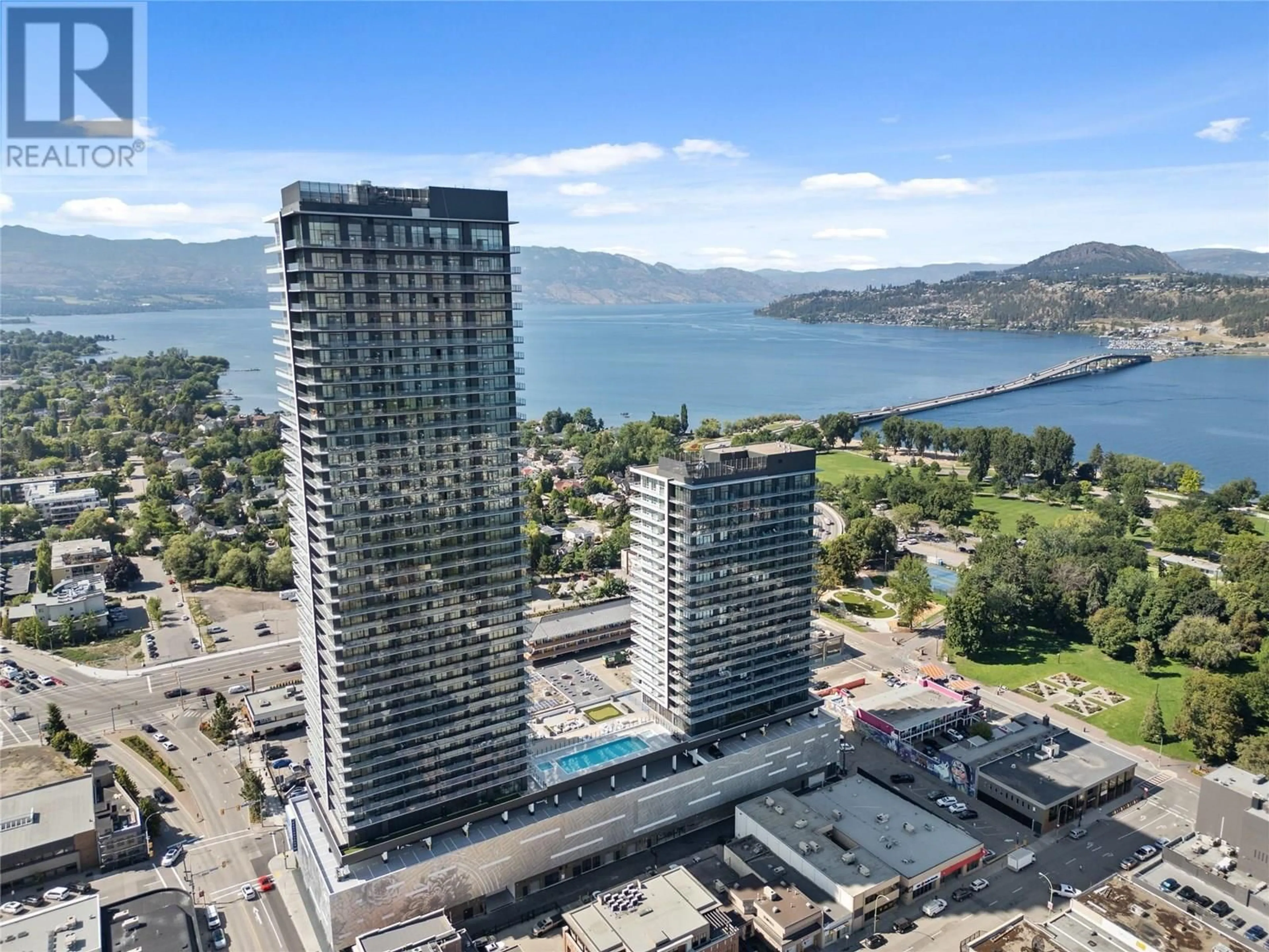 A pic from outside/outdoor area/front of a property/back of a property/a pic from drone, water/lake/river/ocean view for 1407 - 238 LEON AVENUE, Kelowna British Columbia V1Y0N6
