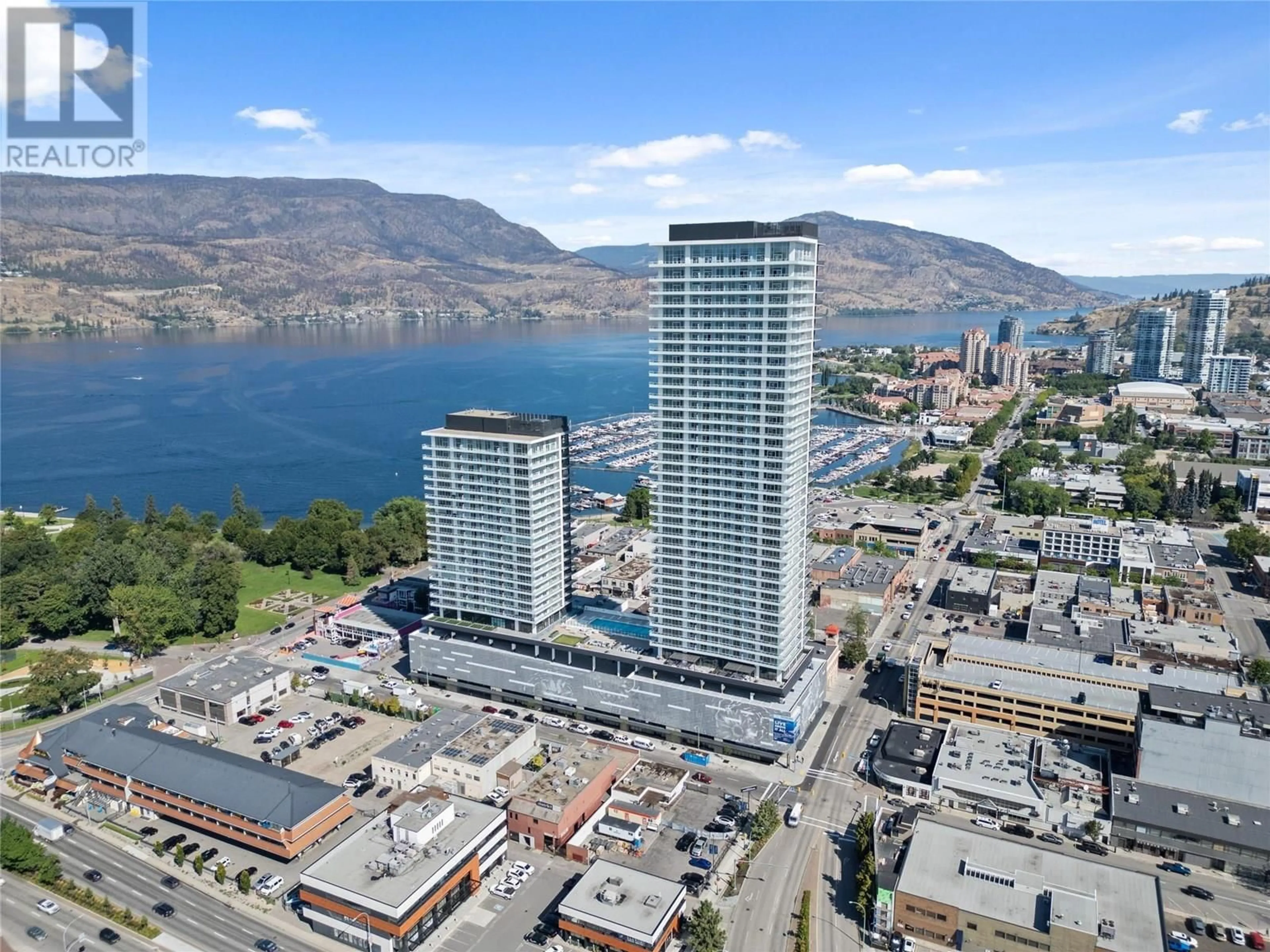 A pic from outside/outdoor area/front of a property/back of a property/a pic from drone, water/lake/river/ocean view for 1407 - 238 LEON AVENUE, Kelowna British Columbia V1Y0N6