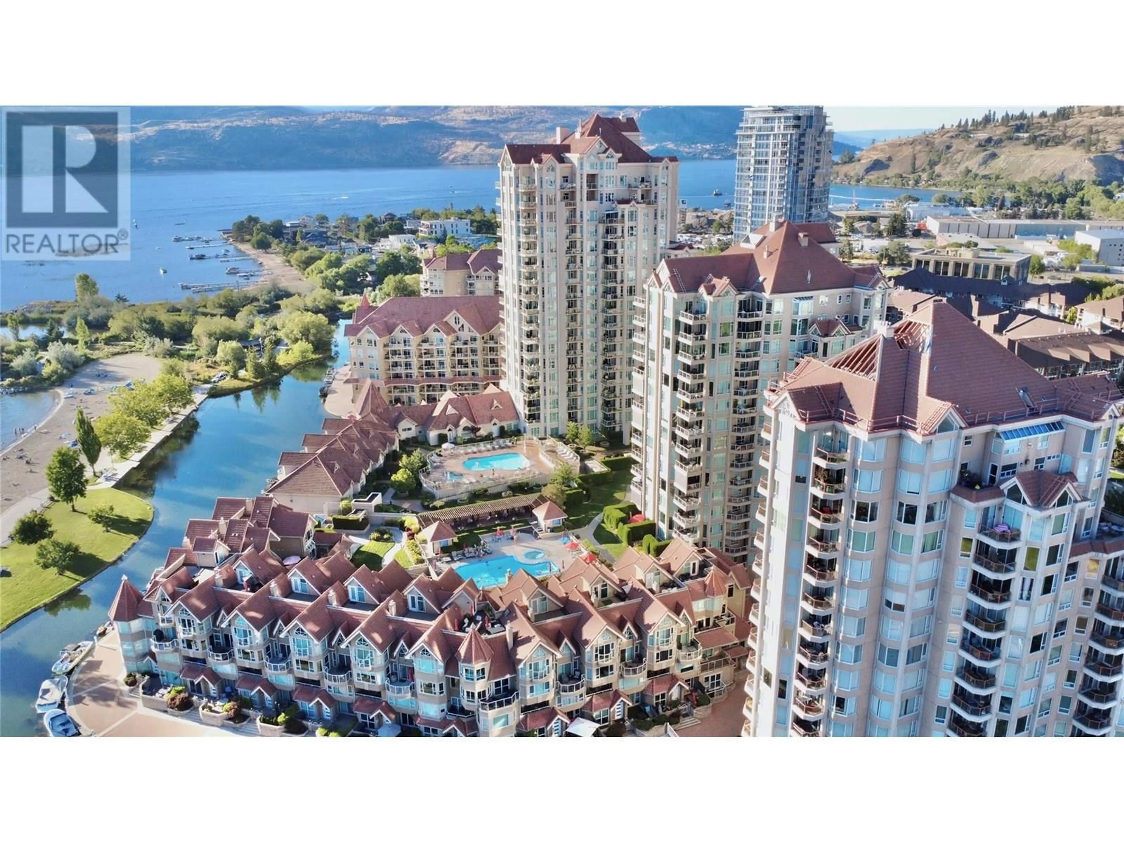 A pic from outside/outdoor area/front of a property/back of a property/a pic from drone, water/lake/river/ocean view for 1702 - 1152 SUNSET DRIVE, Kelowna British Columbia V1Y9R7
