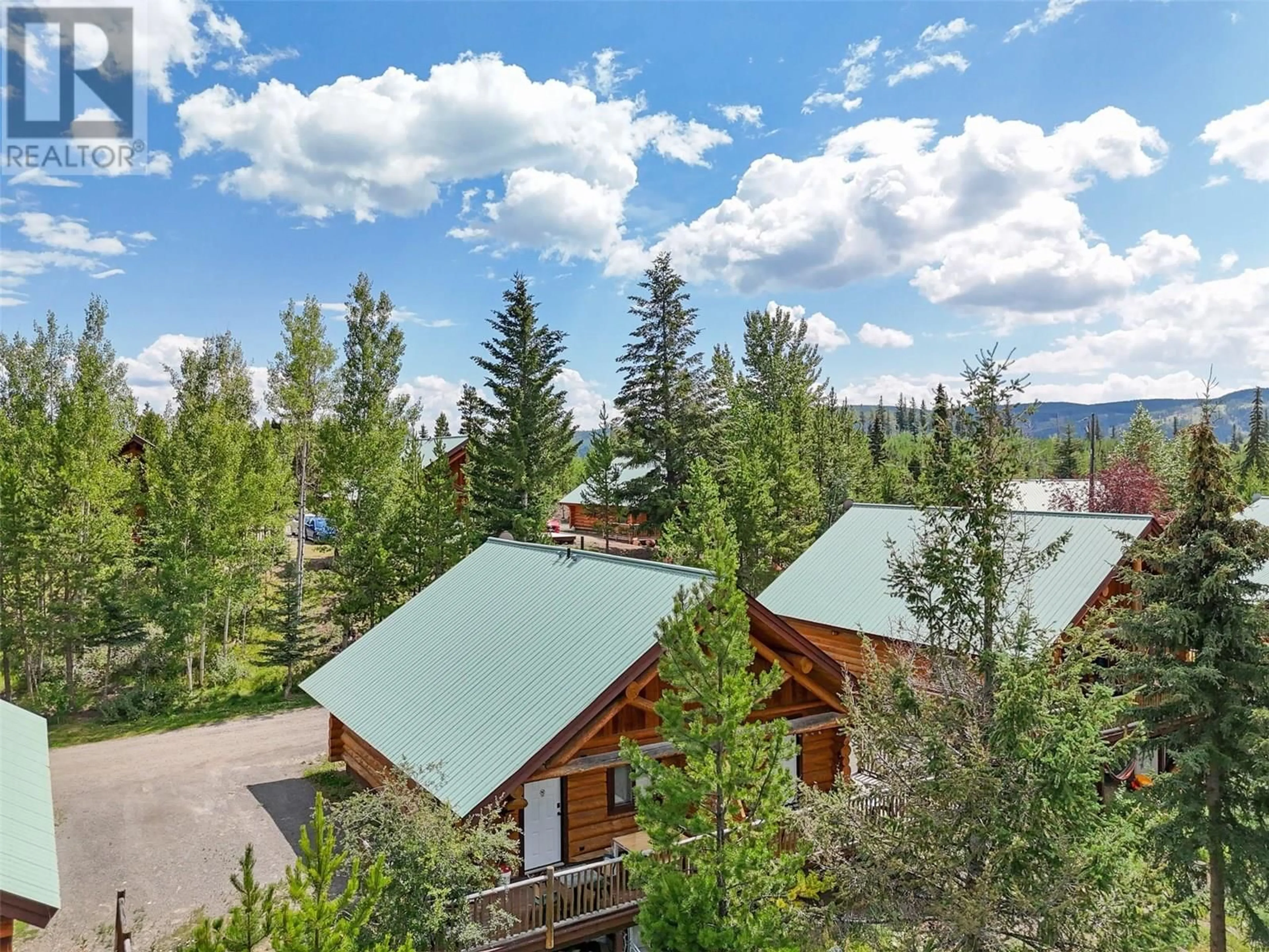 A pic from outside/outdoor area/front of a property/back of a property/a pic from drone, mountain view for 7 - 5485 LAC LE JEUNE ROAD, Kamloops British Columbia V0K1W0