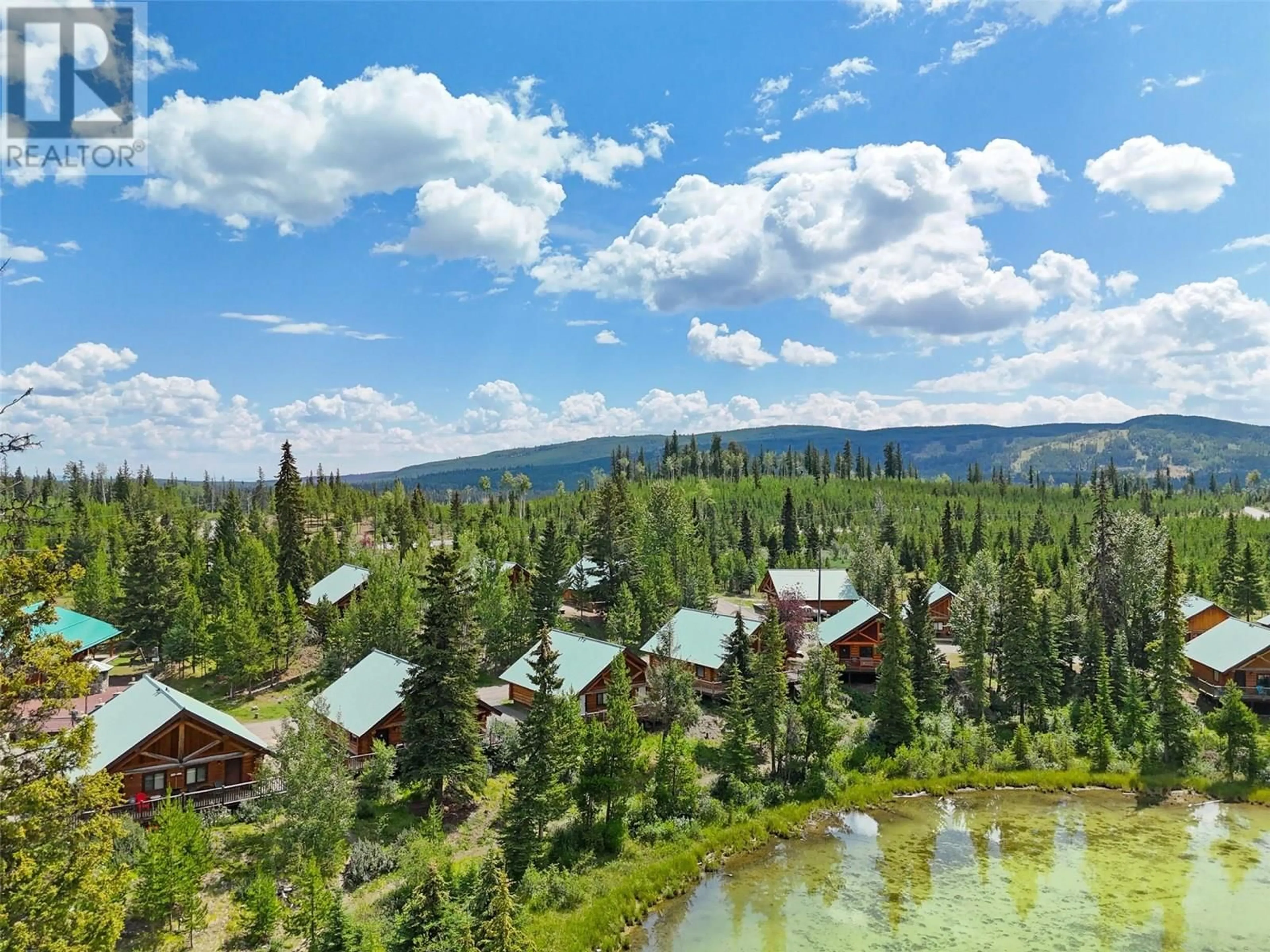 A pic from outside/outdoor area/front of a property/back of a property/a pic from drone, mountain view for 7 - 5485 LAC LE JEUNE ROAD, Kamloops British Columbia V0K1W0
