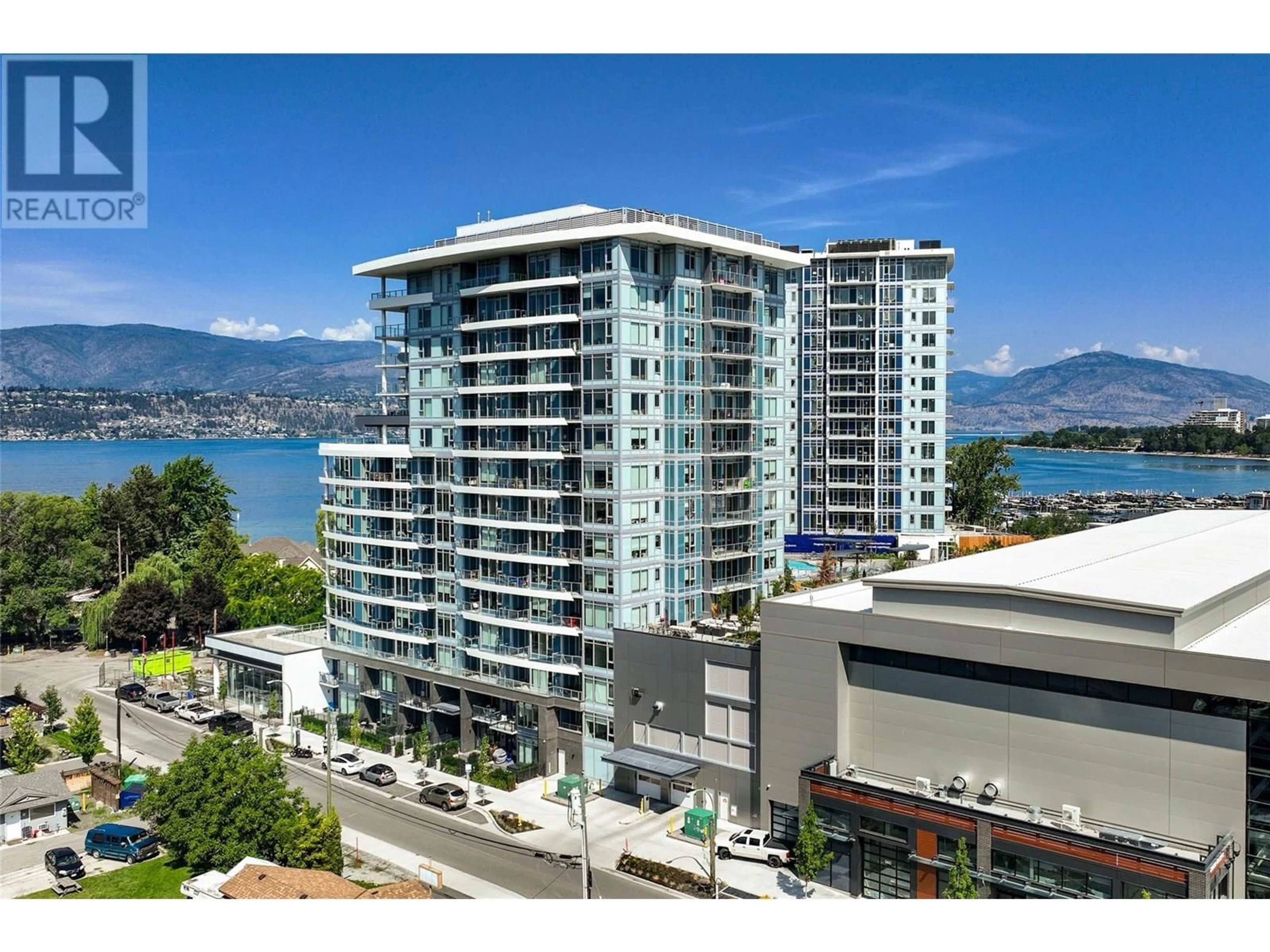 A pic from outside/outdoor area/front of a property/back of a property/a pic from drone, water/lake/river/ocean view for 811 - 3699 CAPOZZI ROAD, Kelowna British Columbia V1W0G3