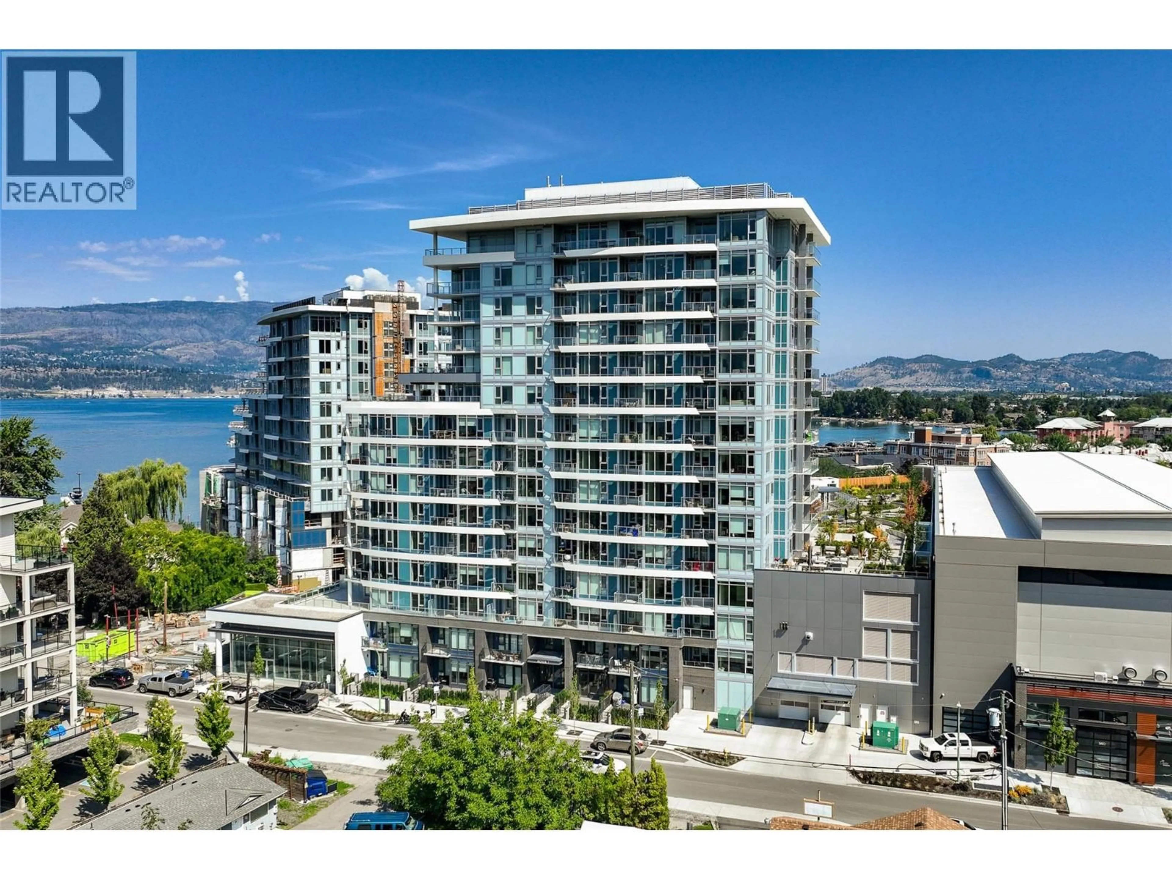 A pic from outside/outdoor area/front of a property/back of a property/a pic from drone, water/lake/river/ocean view for 811 - 3699 CAPOZZI ROAD, Kelowna British Columbia V1W0G3