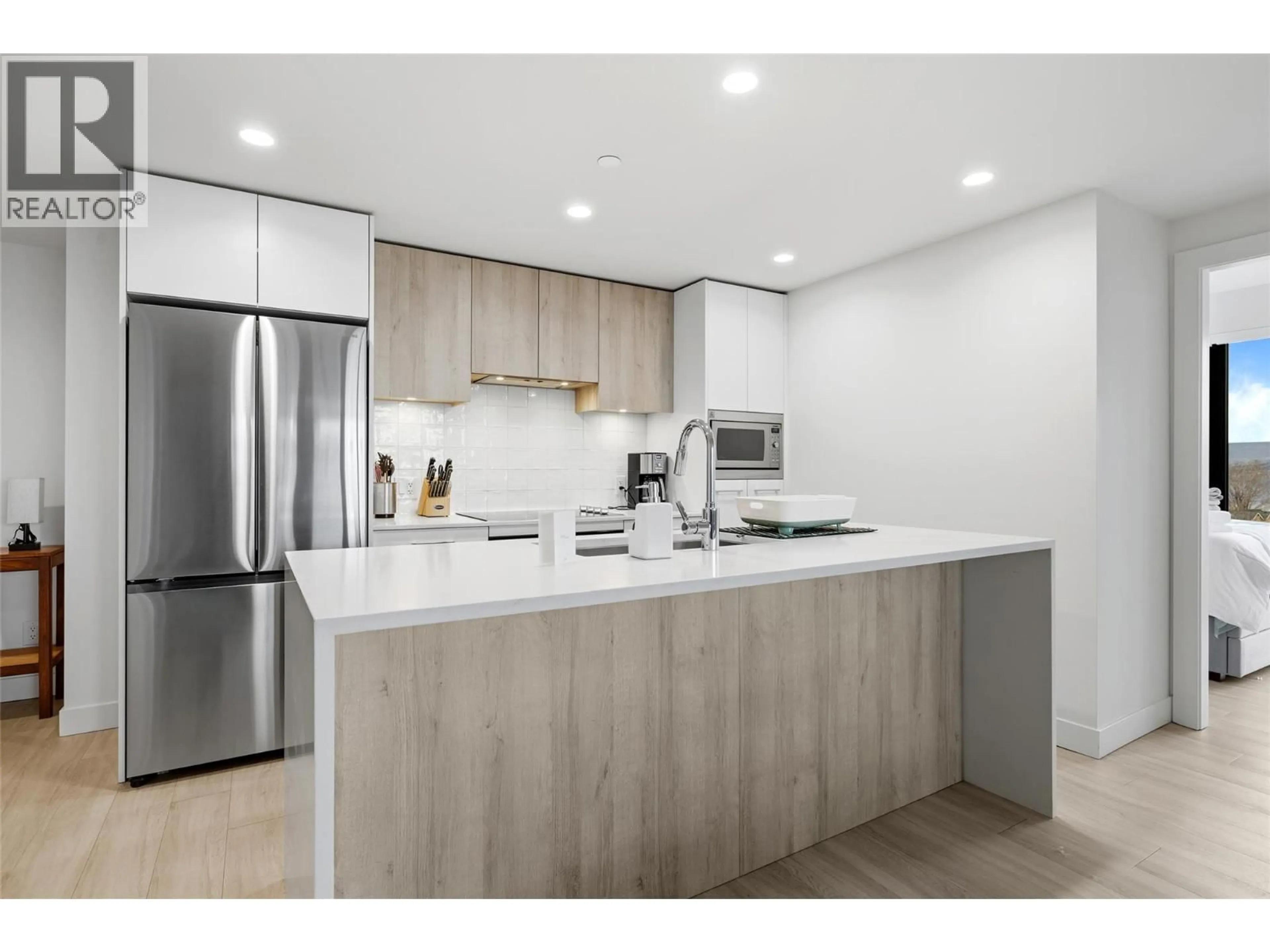Open concept kitchen, unknown for 811 - 3699 CAPOZZI ROAD, Kelowna British Columbia V1W0G3