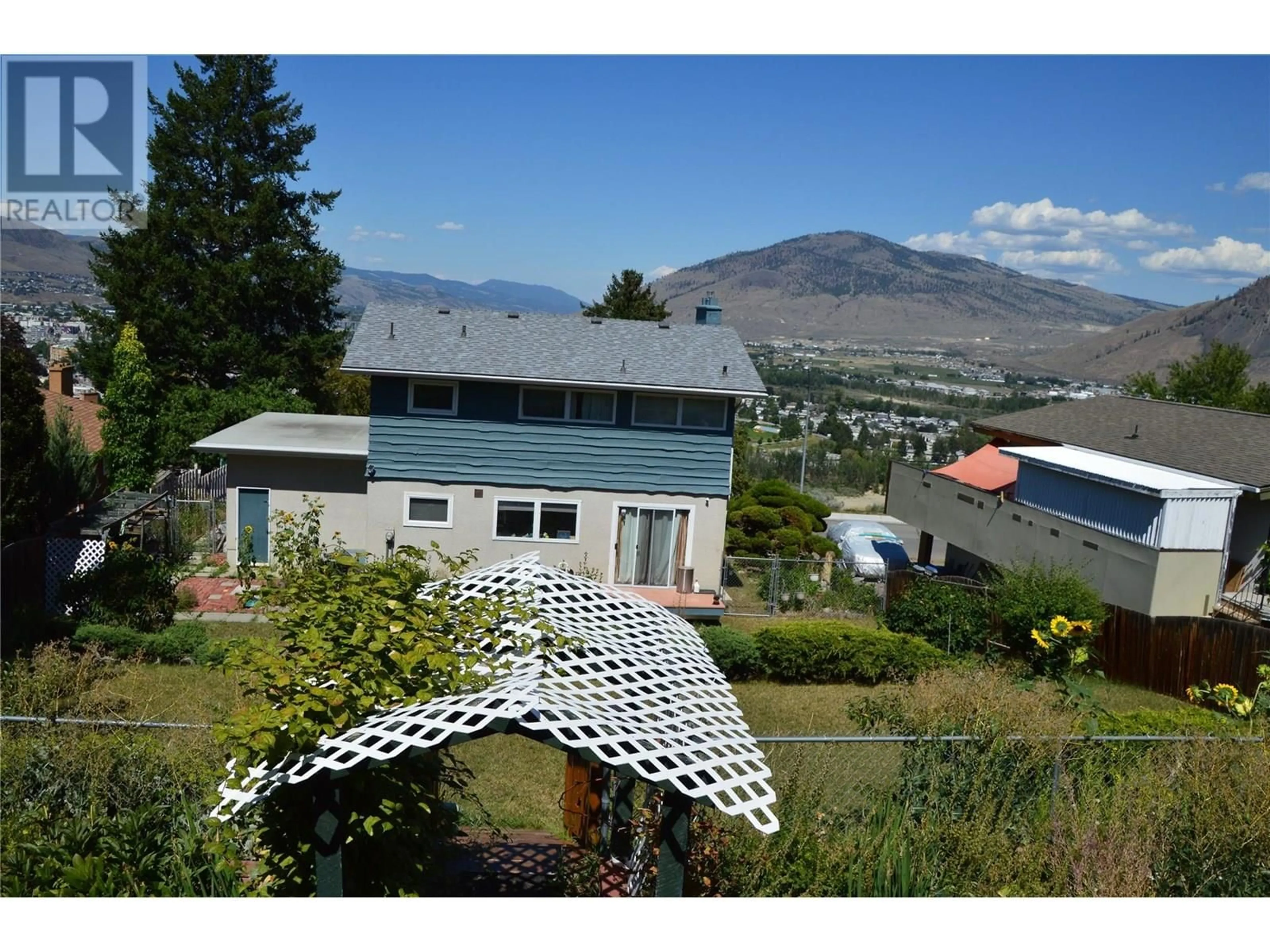 A pic from outside/outdoor area/front of a property/back of a property/a pic from drone, mountain view for 507 STRATHCONA TERRACE, Kamloops British Columbia V2C1C2