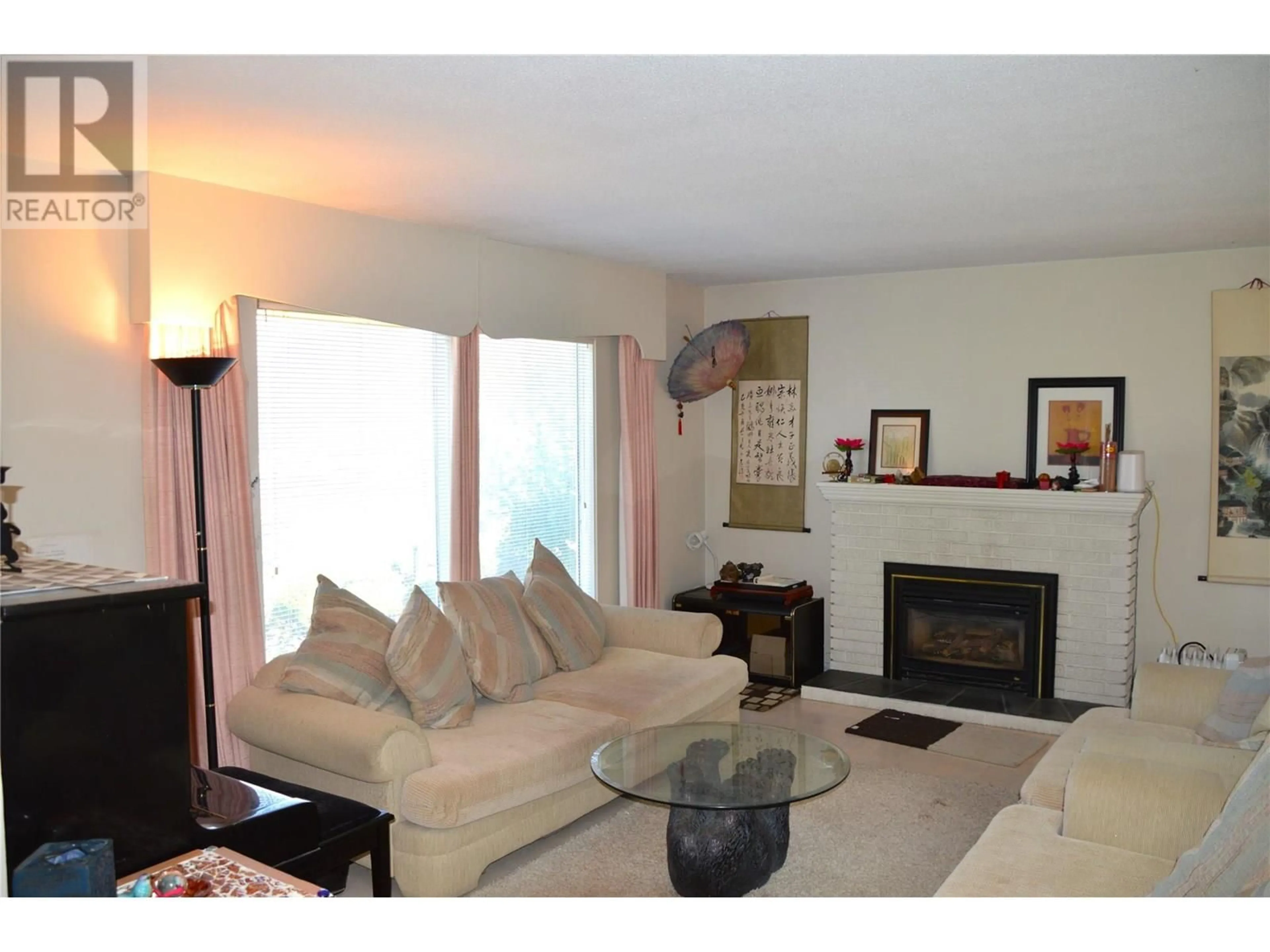 Living room with furniture, wood/laminate floor for 507 STRATHCONA TERRACE, Kamloops British Columbia V2C1C2