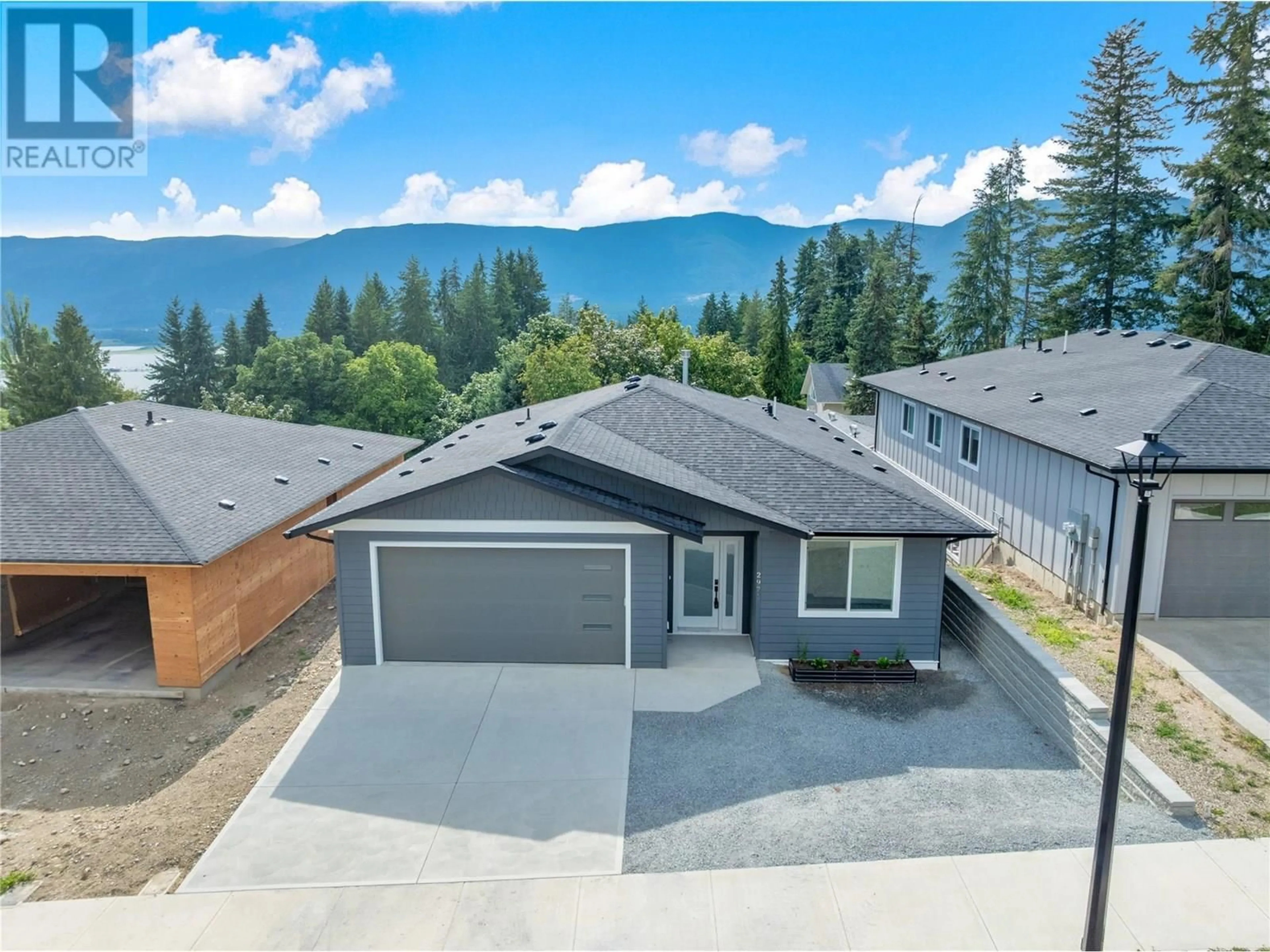 A pic from outside/outdoor area/front of a property/back of a property/a pic from drone, mountain view for 2971 27 STREET NORTHEAST, Salmon Arm British Columbia V1E2Z7