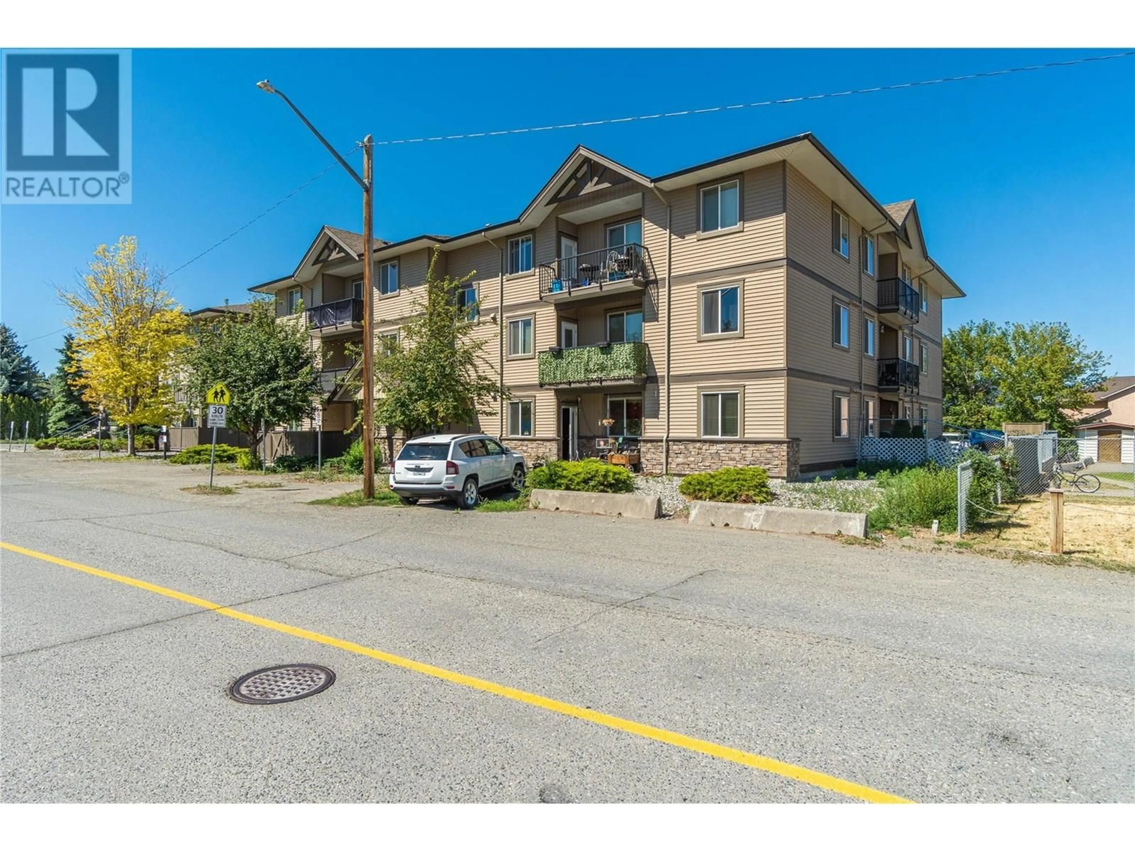 A pic from outside/outdoor area/front of a property/back of a property/a pic from drone, street for 304 - 1701 MENZIES STREET, Merritt British Columbia V1K1A5