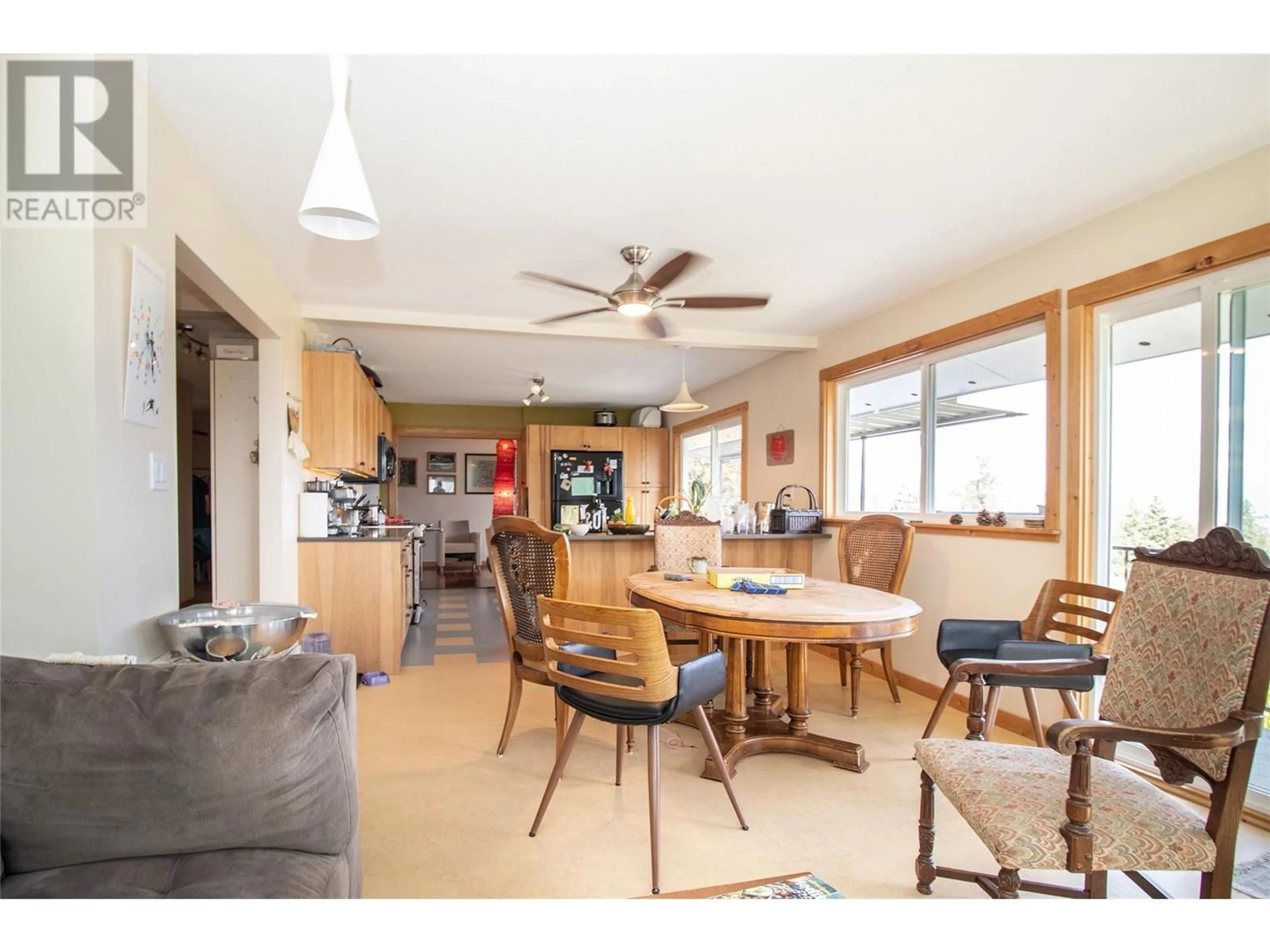 Open concept kitchen, wood/laminate floor for 2741 SUGOSA PLACE, West Kelowna British Columbia V4T2X3