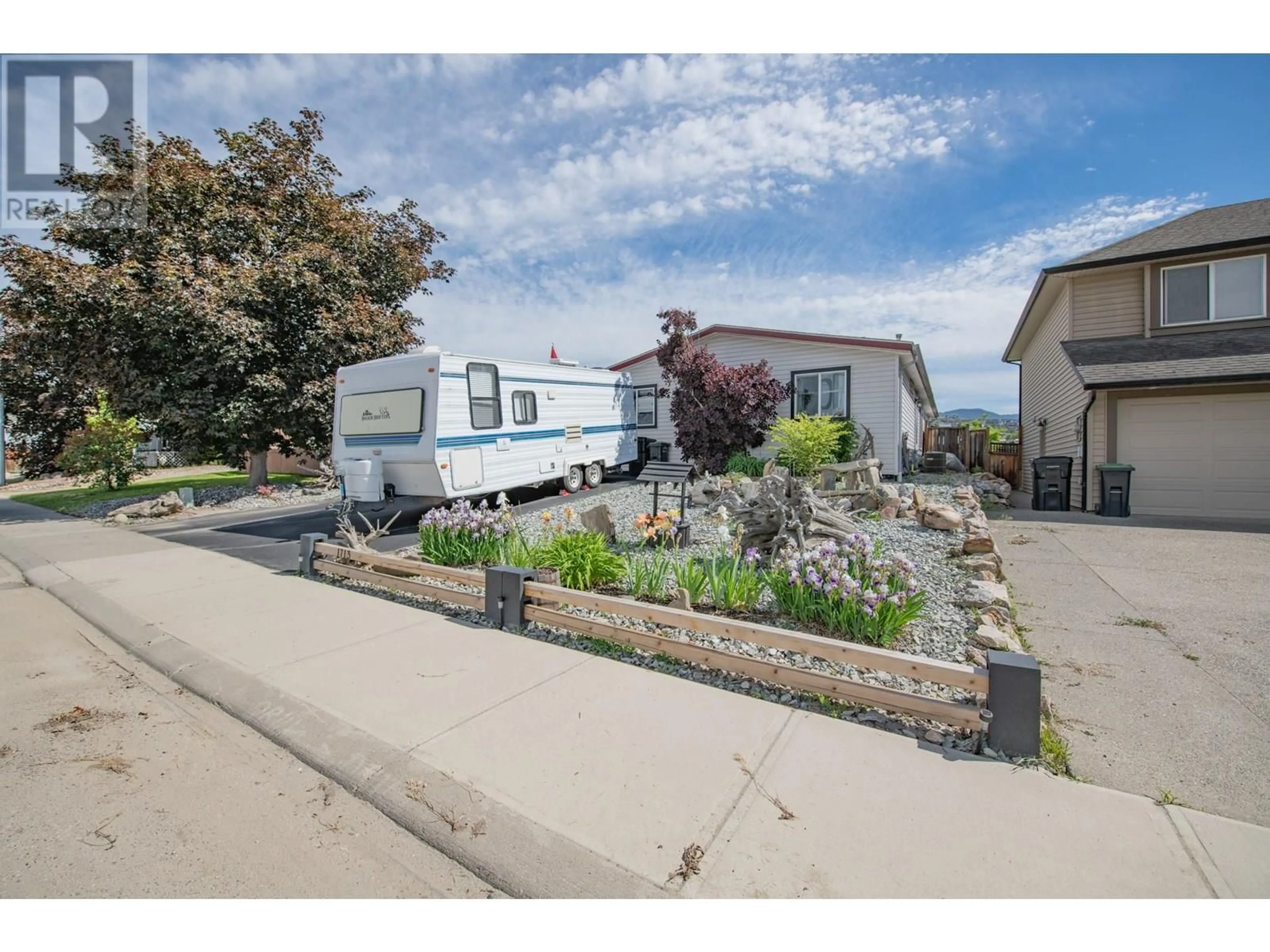 A pic from outside/outdoor area/front of a property/back of a property/a pic from drone, street for 1713 15 AVENUE, Vernon British Columbia V1T9R4