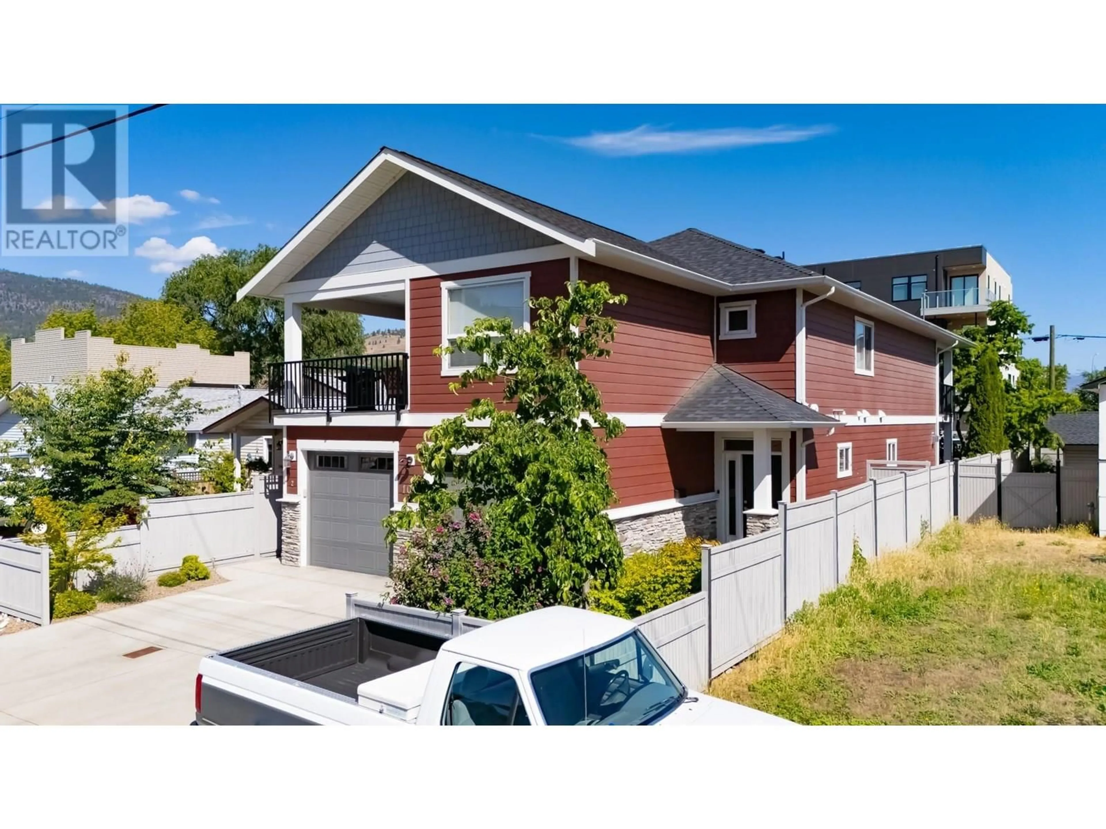 Home with brick exterior material, street for 1011 DYNES AVENUE, Penticton British Columbia V2A1E9