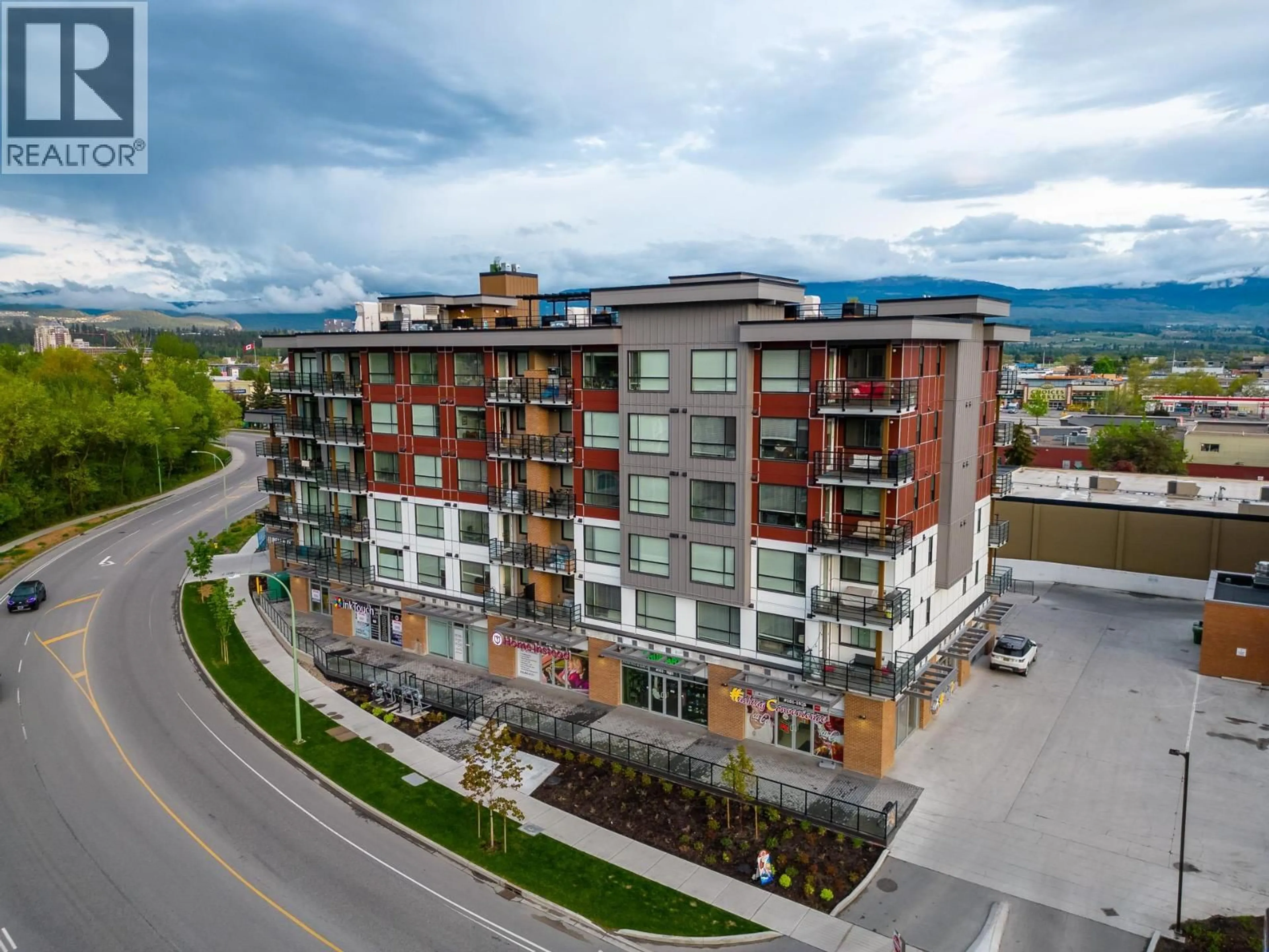 A pic from outside/outdoor area/front of a property/back of a property/a pic from drone, building for 311 - 1925 ENTERPRISE WAY, Kelowna British Columbia V1Y0J8