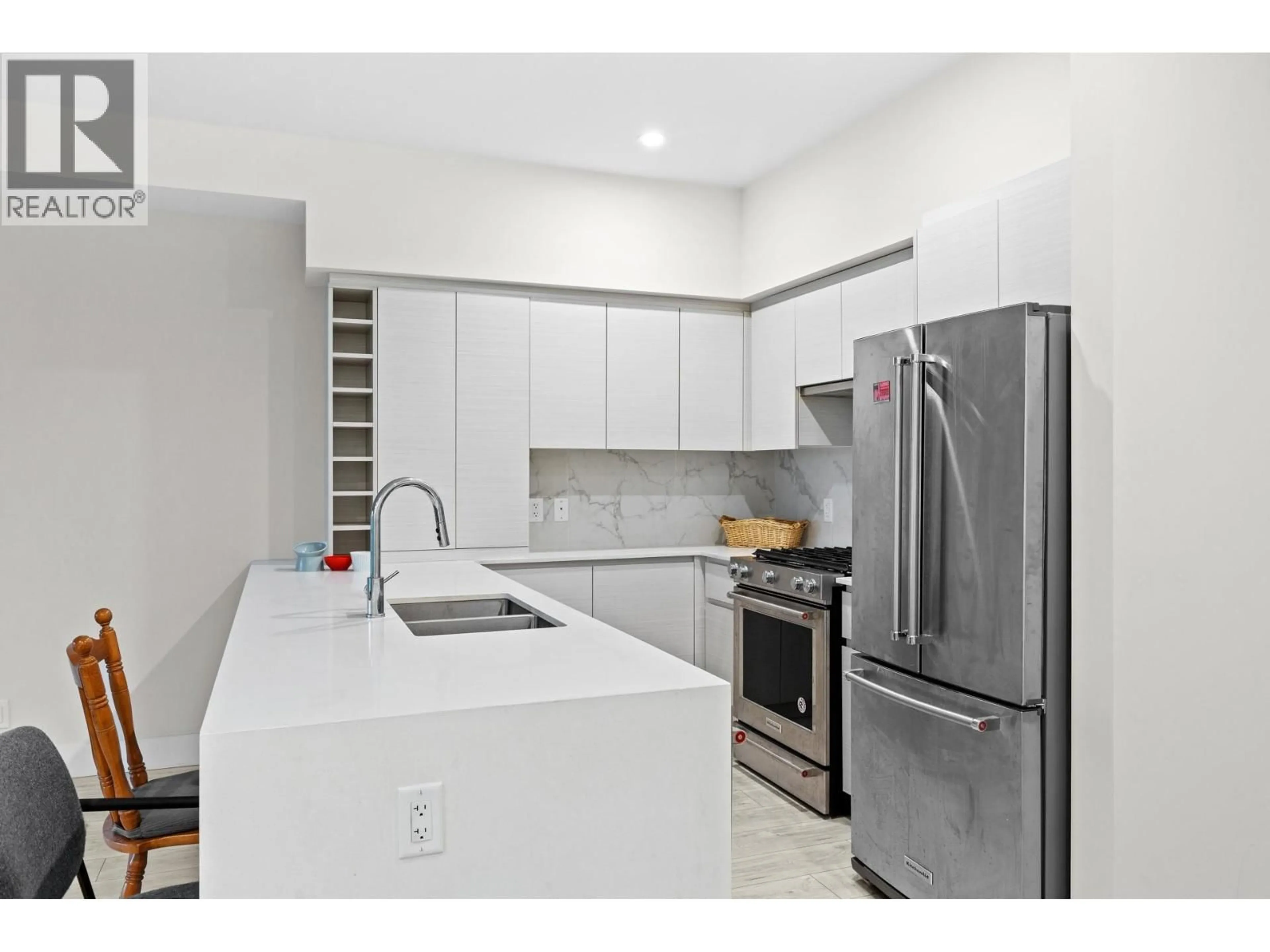 Standard kitchen, ceramic/tile floor for 311 - 1925 ENTERPRISE WAY, Kelowna British Columbia V1Y0J8