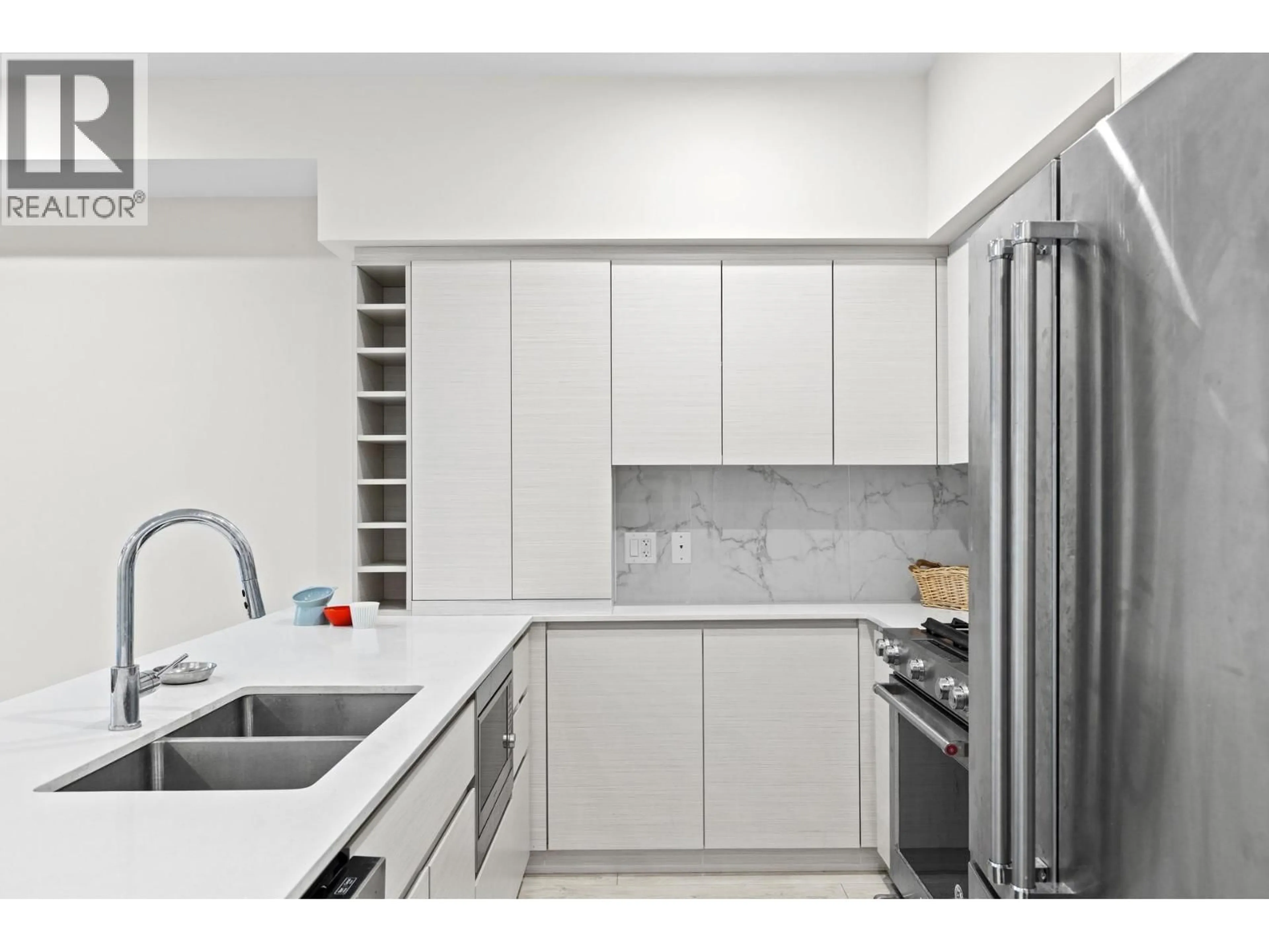Standard kitchen, ceramic/tile floor for 311 - 1925 ENTERPRISE WAY, Kelowna British Columbia V1Y0J8