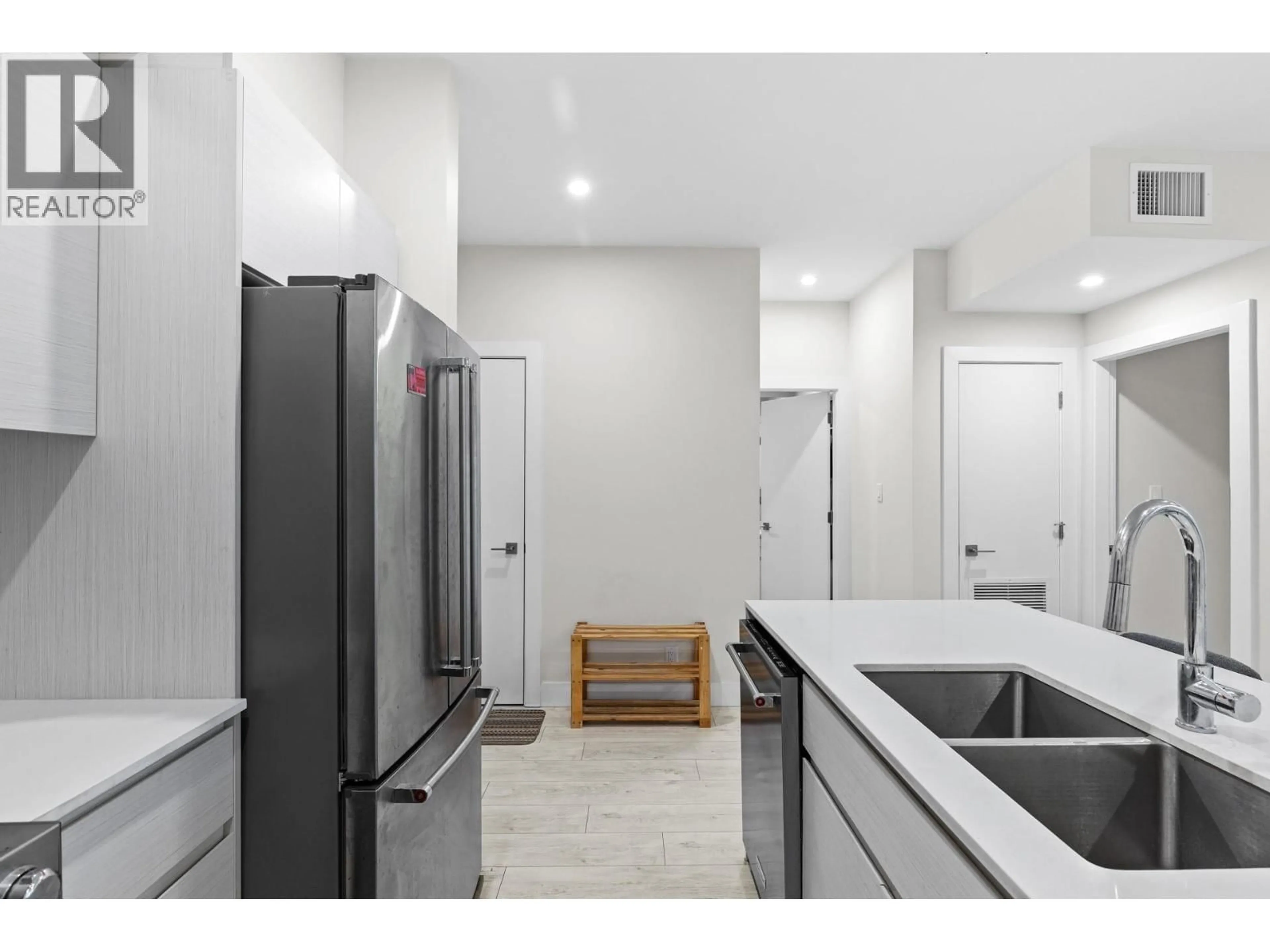 Standard kitchen, ceramic/tile floor for 311 - 1925 ENTERPRISE WAY, Kelowna British Columbia V1Y0J8