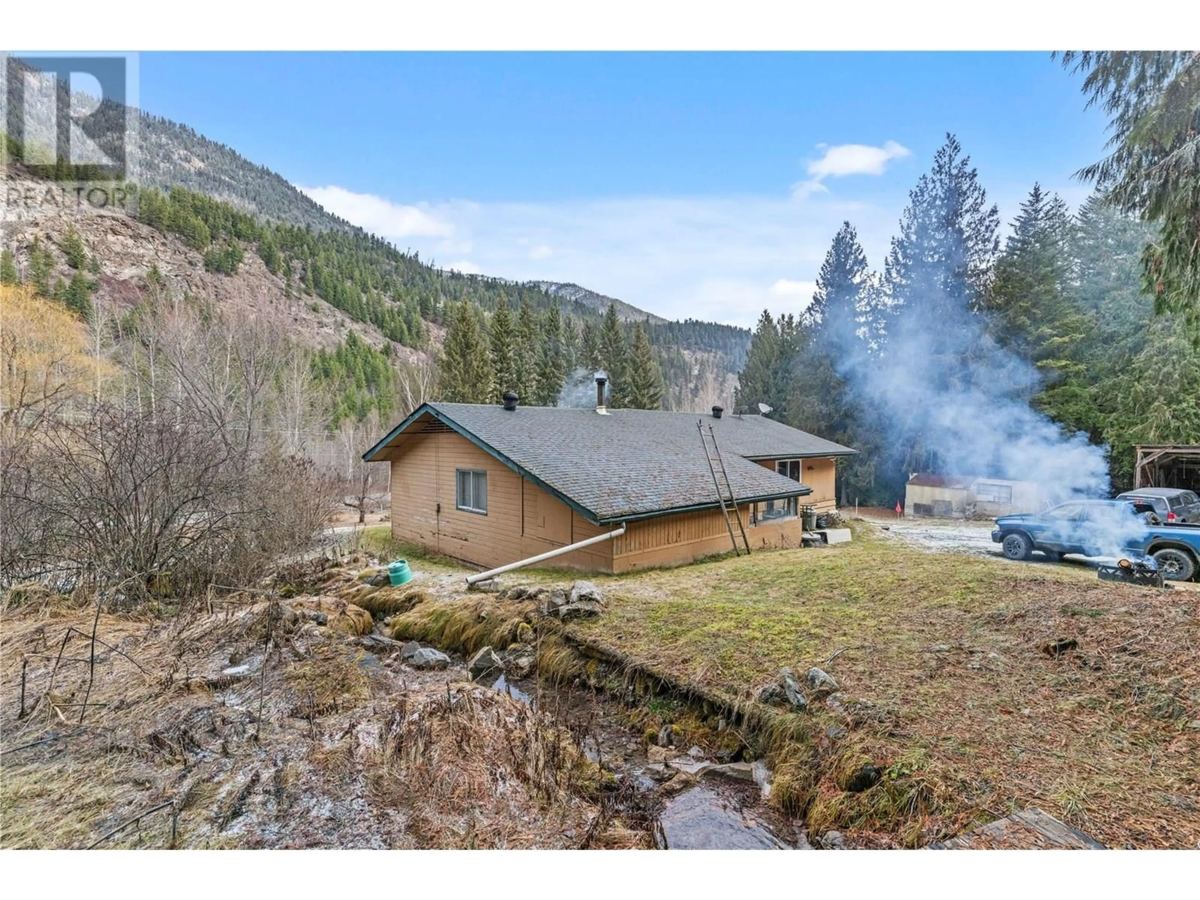 A pic from outside/outdoor area/front of a property/back of a property/a pic from drone, mountain view for 2055 AGATE BAY ROAD, Barriere British Columbia V0E2E0