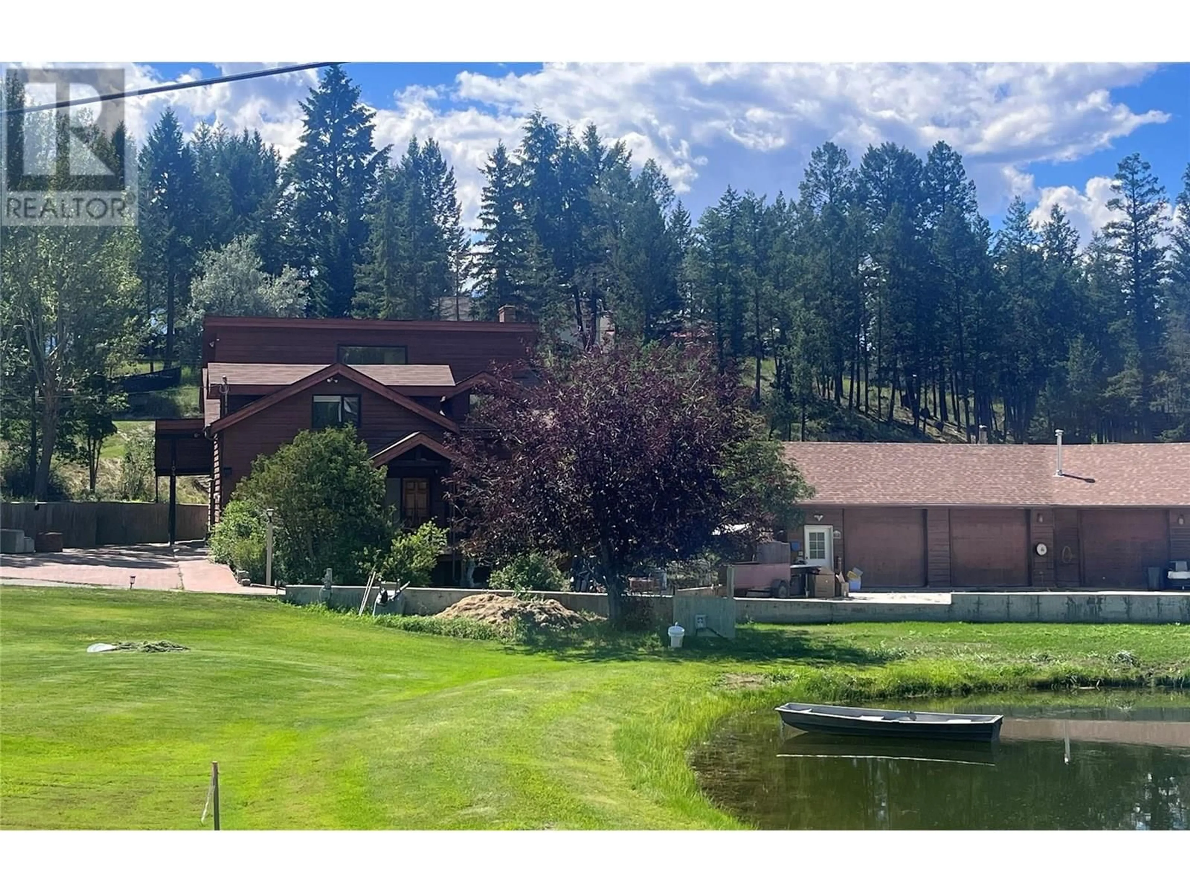 A pic from outside/outdoor area/front of a property/back of a property/a pic from drone, mountain view for 1049 SWANSEA ROAD, Invermere British Columbia V0A1K3