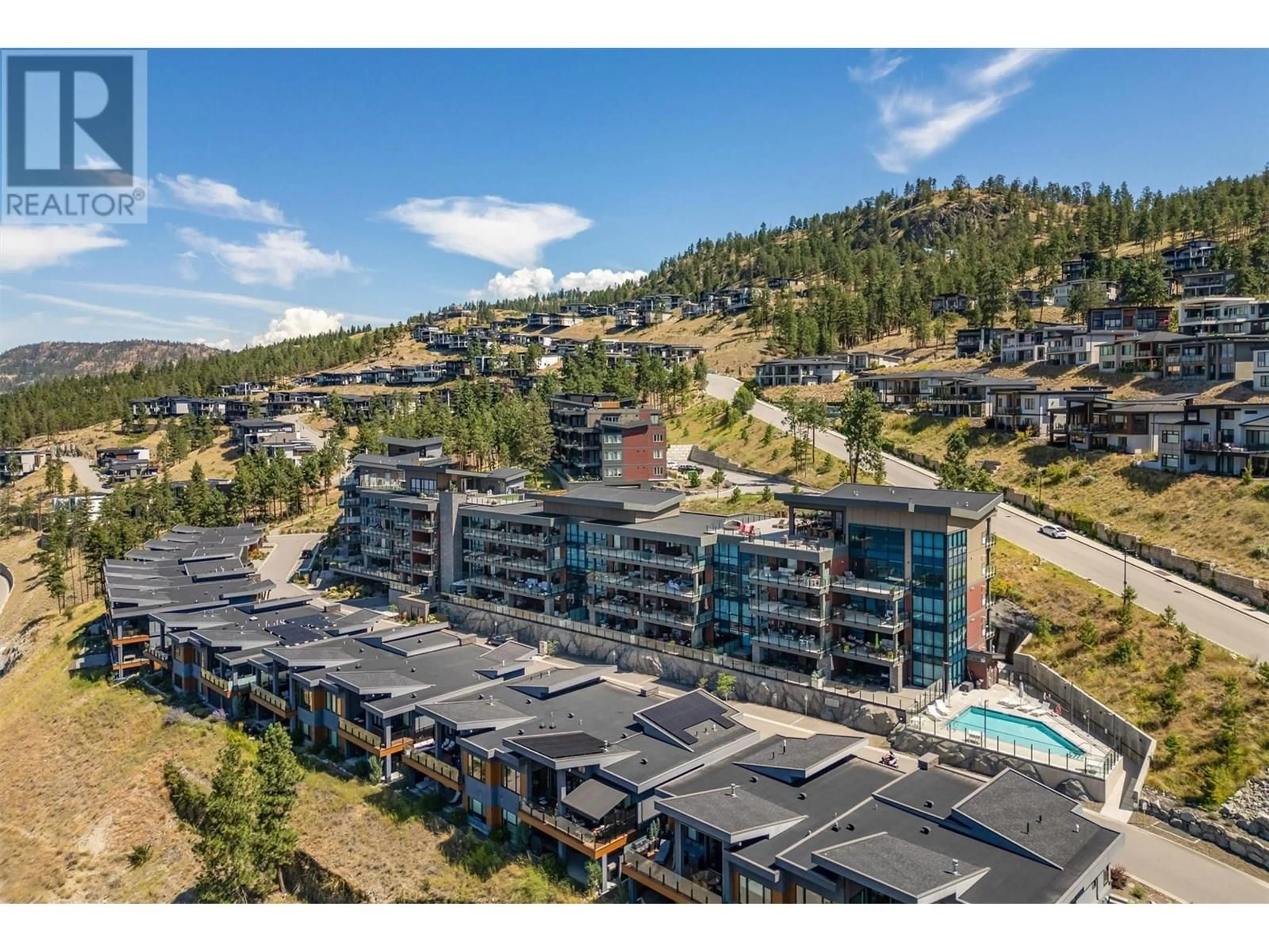 A pic from outside/outdoor area/front of a property/back of a property/a pic from drone, mountain view for 205 - 3475 GRANITE CLOSE, Kelowna British Columbia V1V0B9