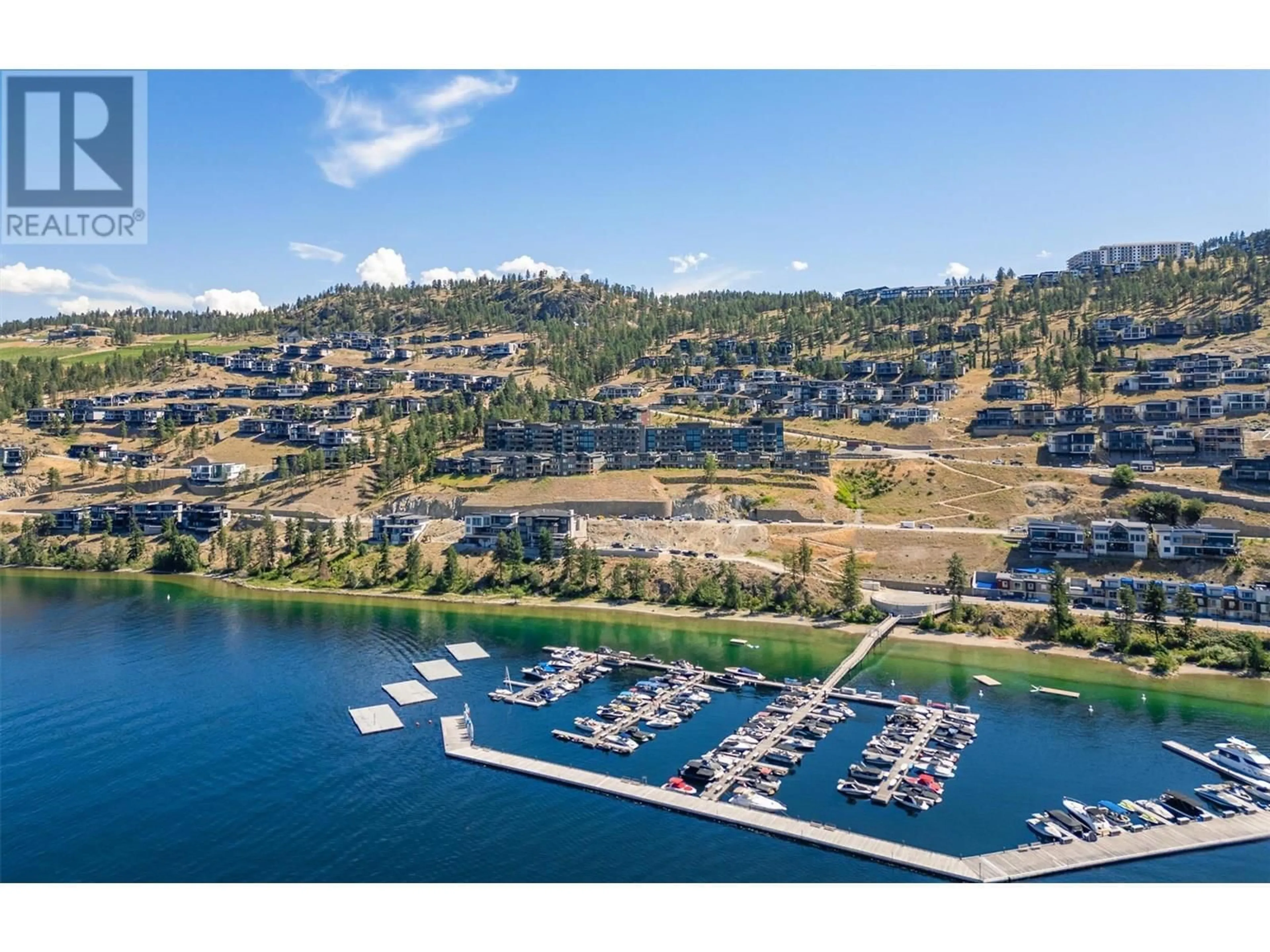 A pic from outside/outdoor area/front of a property/back of a property/a pic from drone, water/lake/river/ocean view for 205 - 3475 GRANITE CLOSE, Kelowna British Columbia V1V0B9