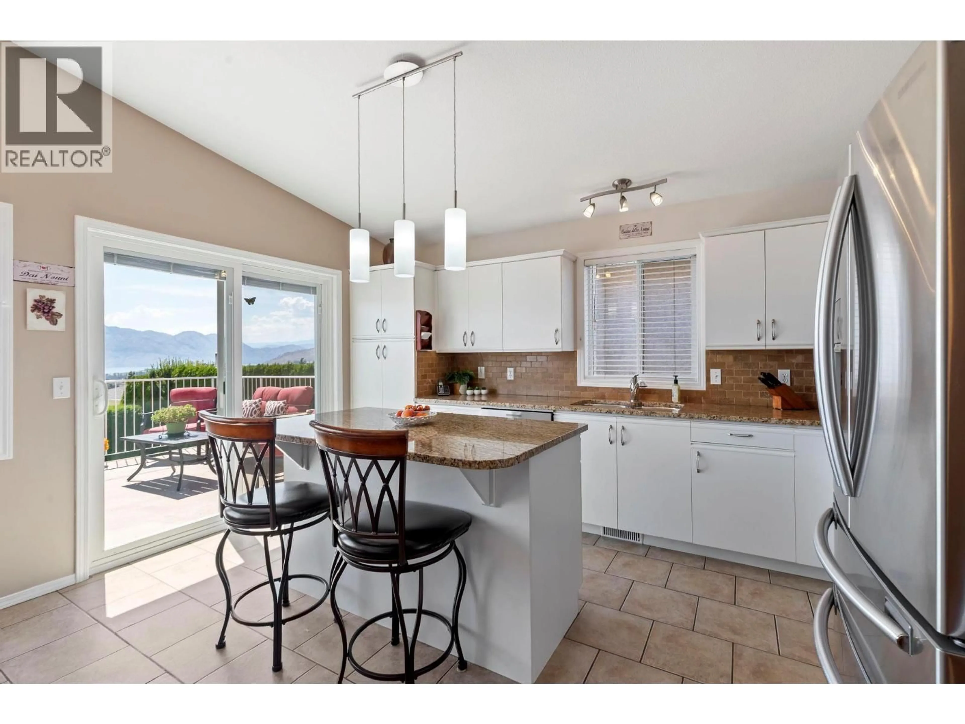 Open concept kitchen, ceramic/tile floor for 412 - 2440 OLD OKANAGAN HIGHWAY, Westbank British Columbia V4T1X6