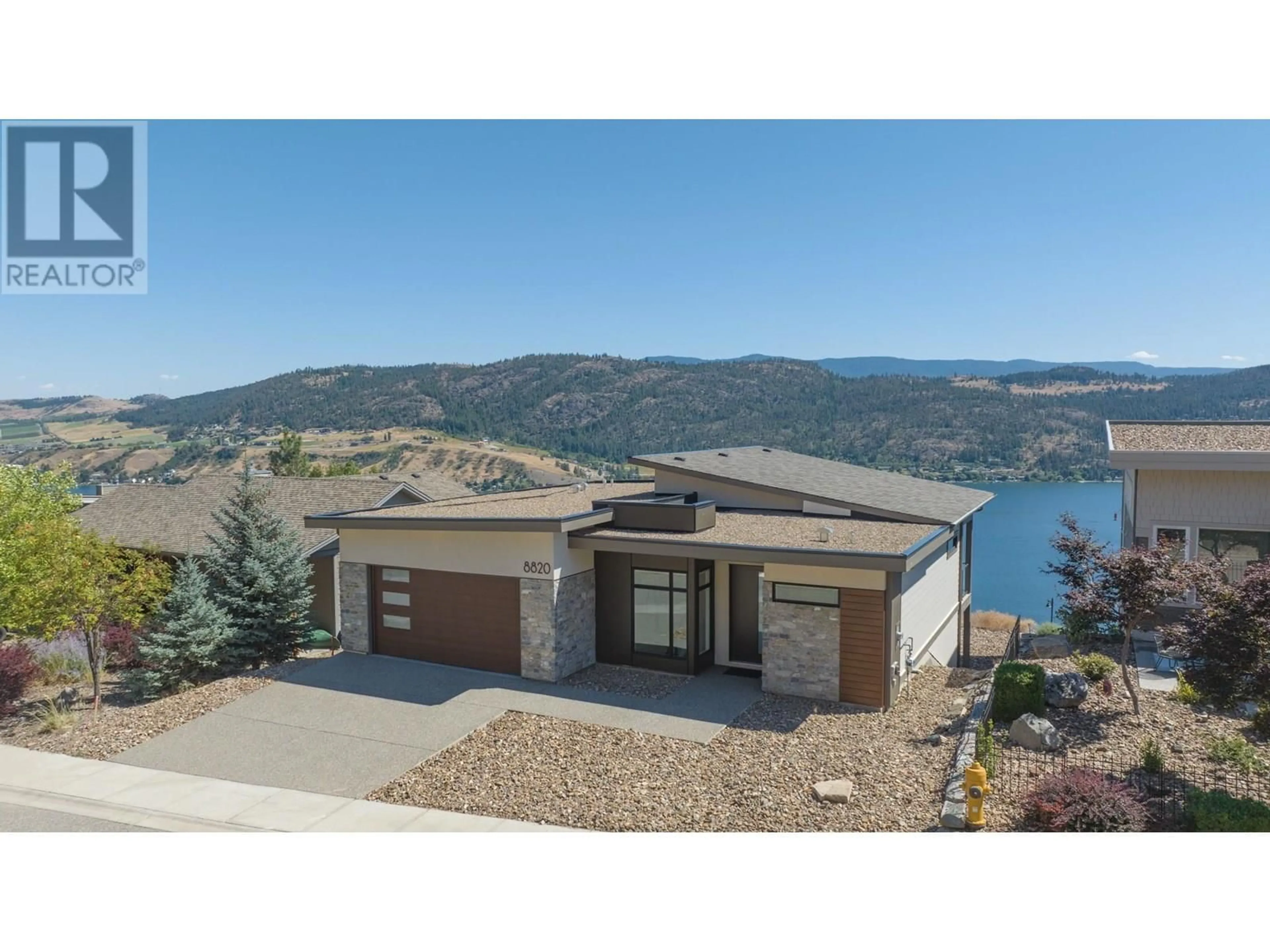 A pic from outside/outdoor area/front of a property/back of a property/a pic from drone, water/lake/river/ocean view for 8820 OXFORD ROAD, Vernon British Columbia V1H2K8